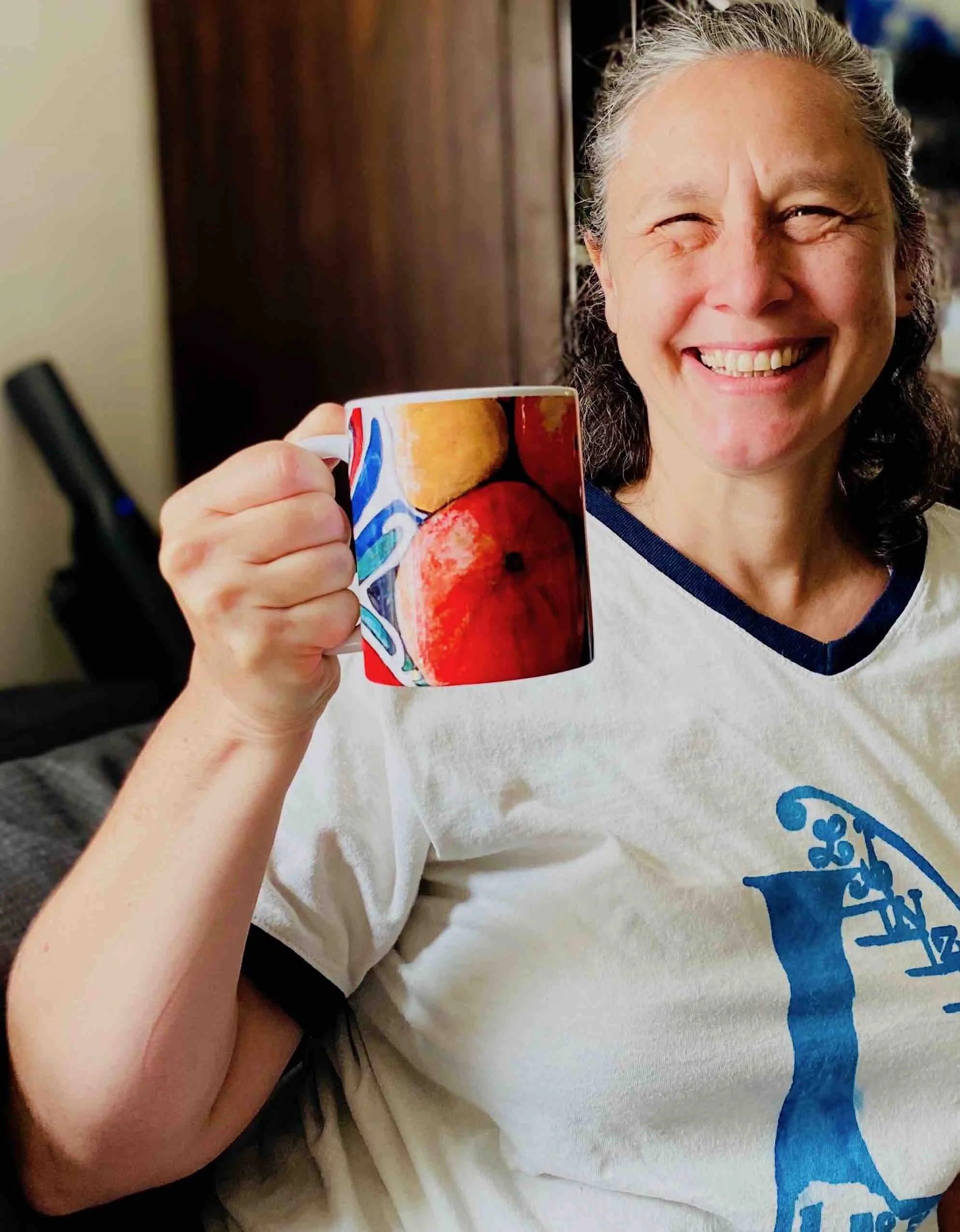 Poet Gabriella Belfiglio gives a "salut'" with Annie's oranges.