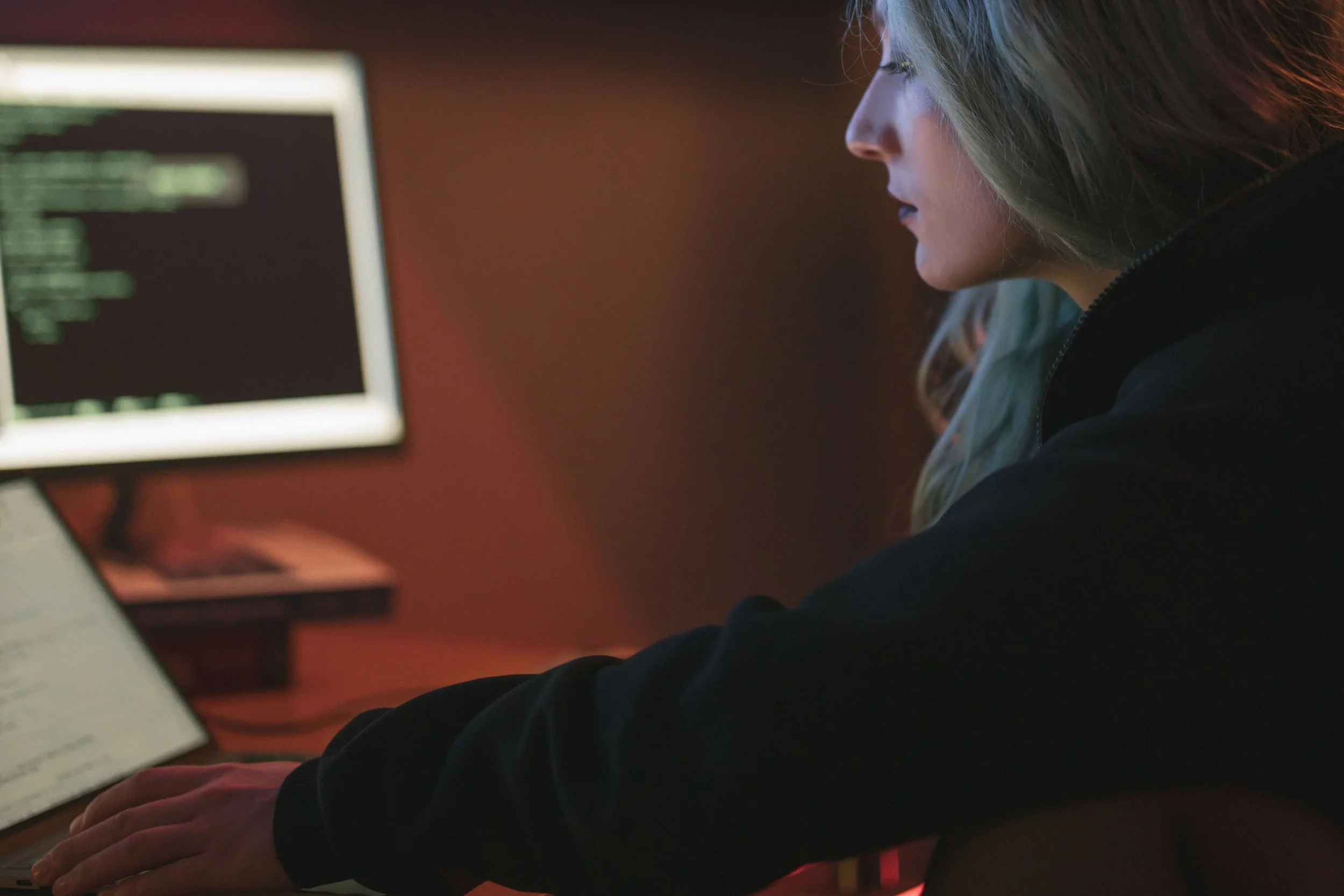 a woman doing computer programming