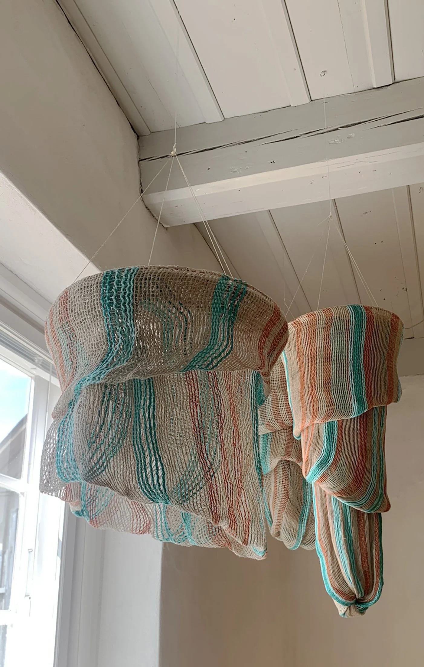 woven hangings inspired by things found on the beach. Woven in the leno technique giving very open weave. Woven in linen, cotton and high twist yarns giving a draped voluminous effect.