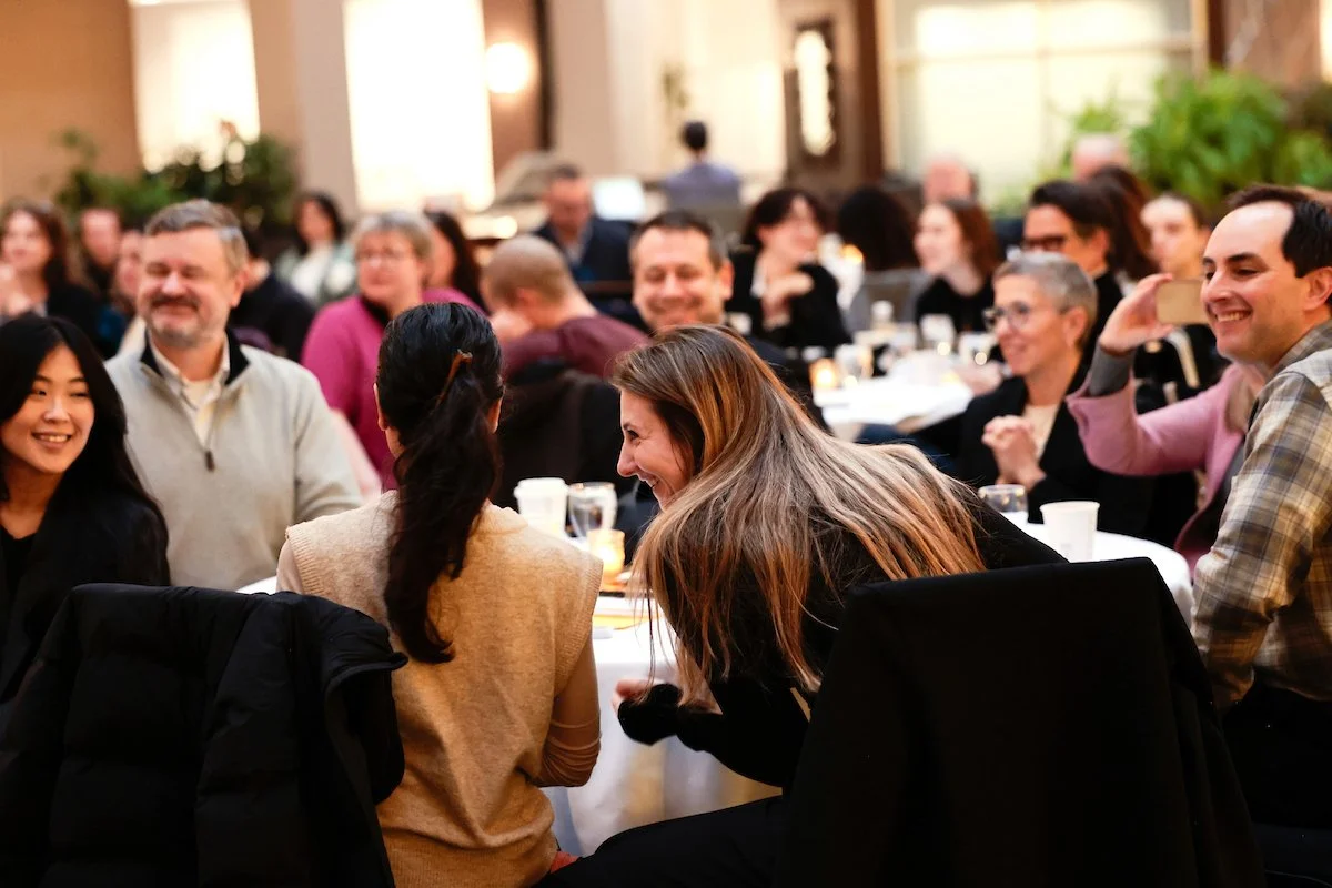 Seattle Times reporter Rebecca Moss sits with colleagues after receiving the Kenneth Bunting Award at the Washington Coalition for Open Government (WashCOG) Sunshine Breakfast honoring open-government advocates, journalists and public officials at th
