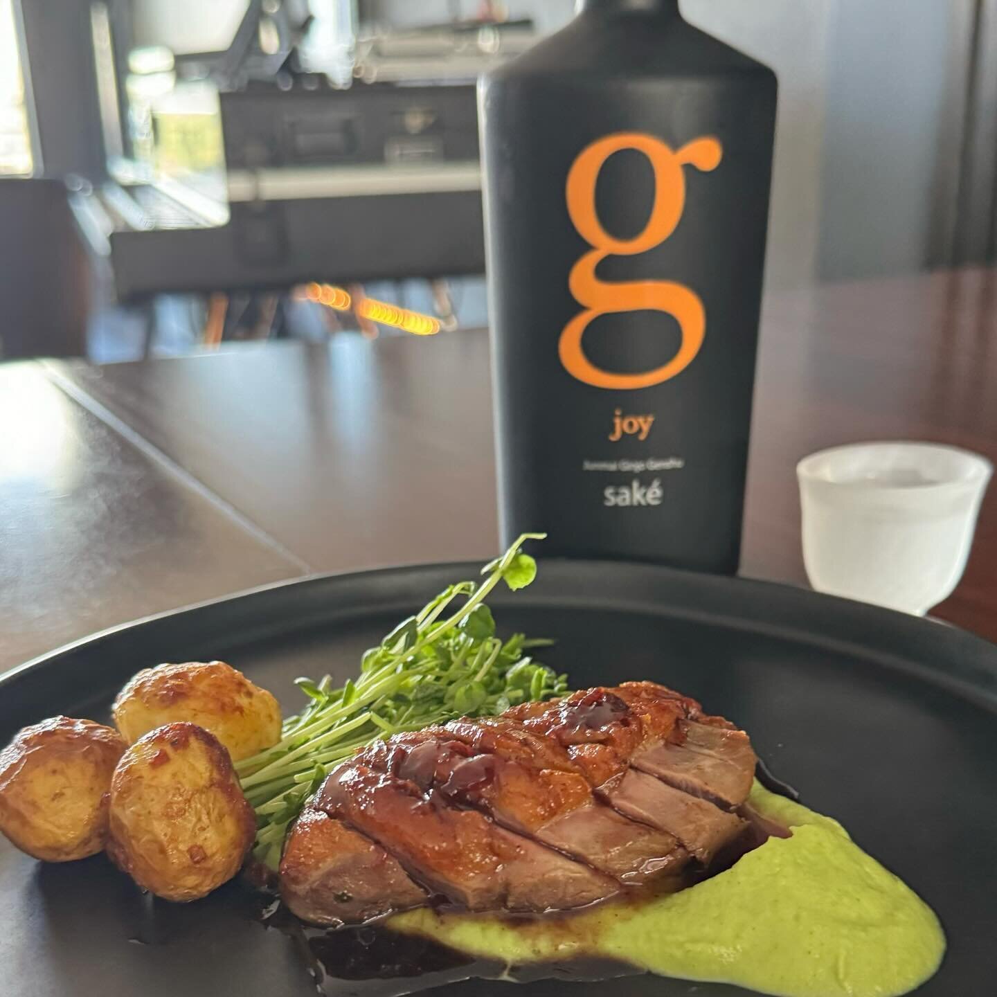 &bull; | &bull; Friday indulgence. 

Sous vide &amp; seared duck breast, honey lemon &amp; fig jam reduction, on a bed of garlic broccoli puree and sides of roasted baby potatoes and micro greens. Paired with a twice pasteruzied delightful g Joy Gens