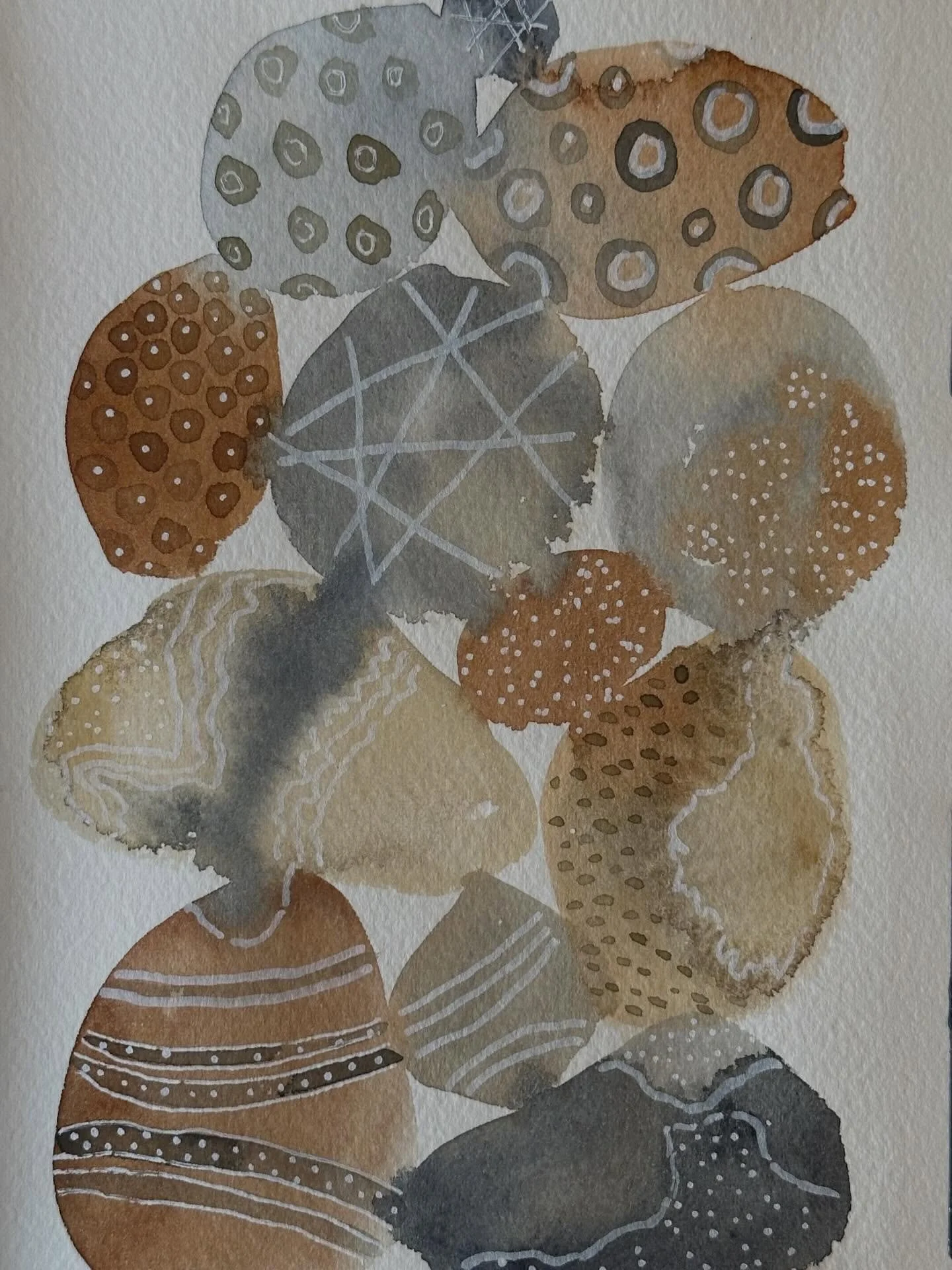 I painted the irregular pebbles project from the book Creative Abstract Watercolor.
