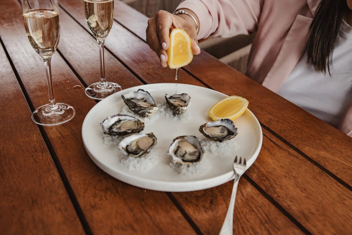 Plucked straight from Tasmanian waters! It's just one of the many reasons to descend to Hobart. Locally sourced, perfectly chilled, and served rooftop at The Deck-with Mountain views to match 😊✨