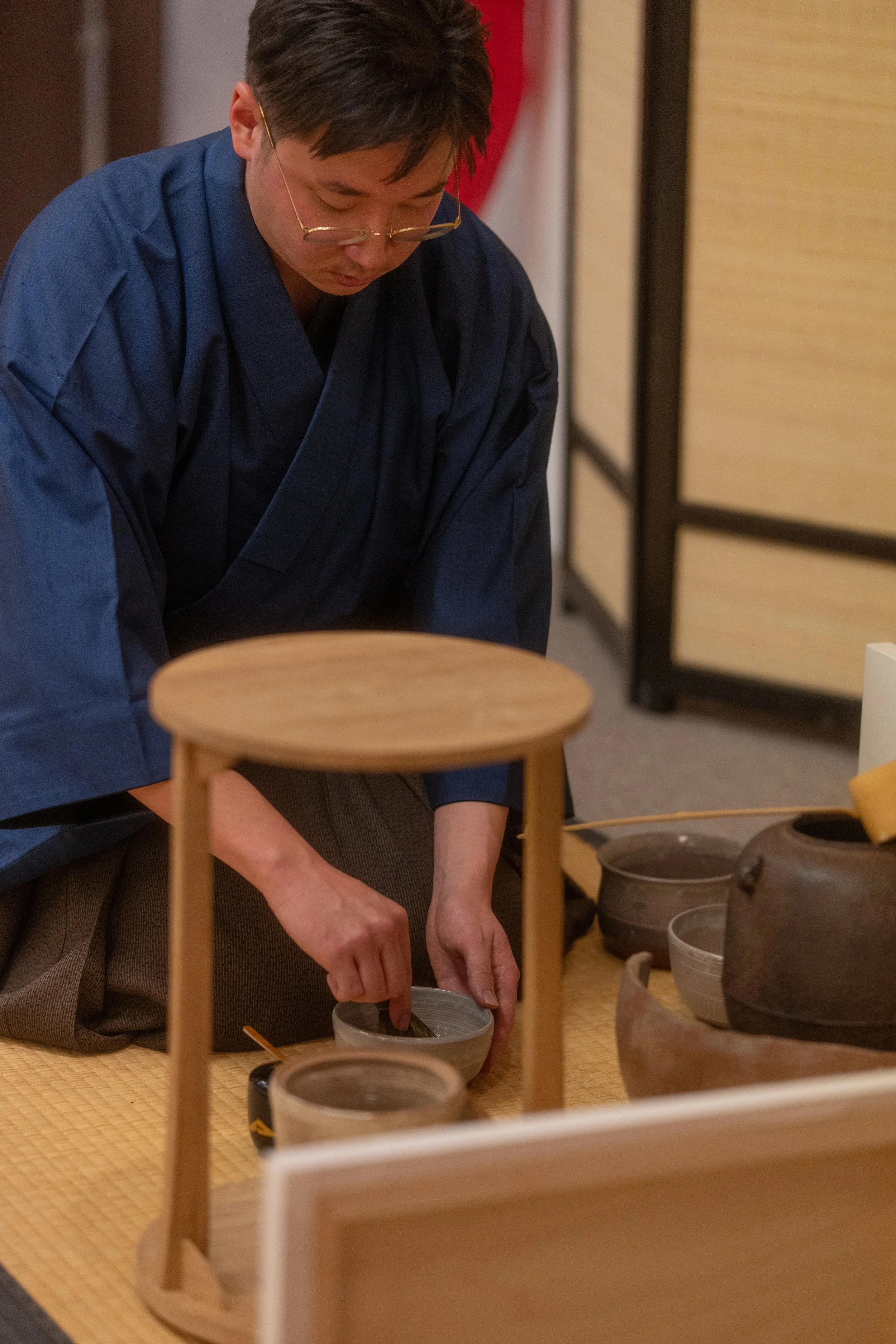 Noah Haruki demonstrating tea ceremony. photo by Taku Onishi