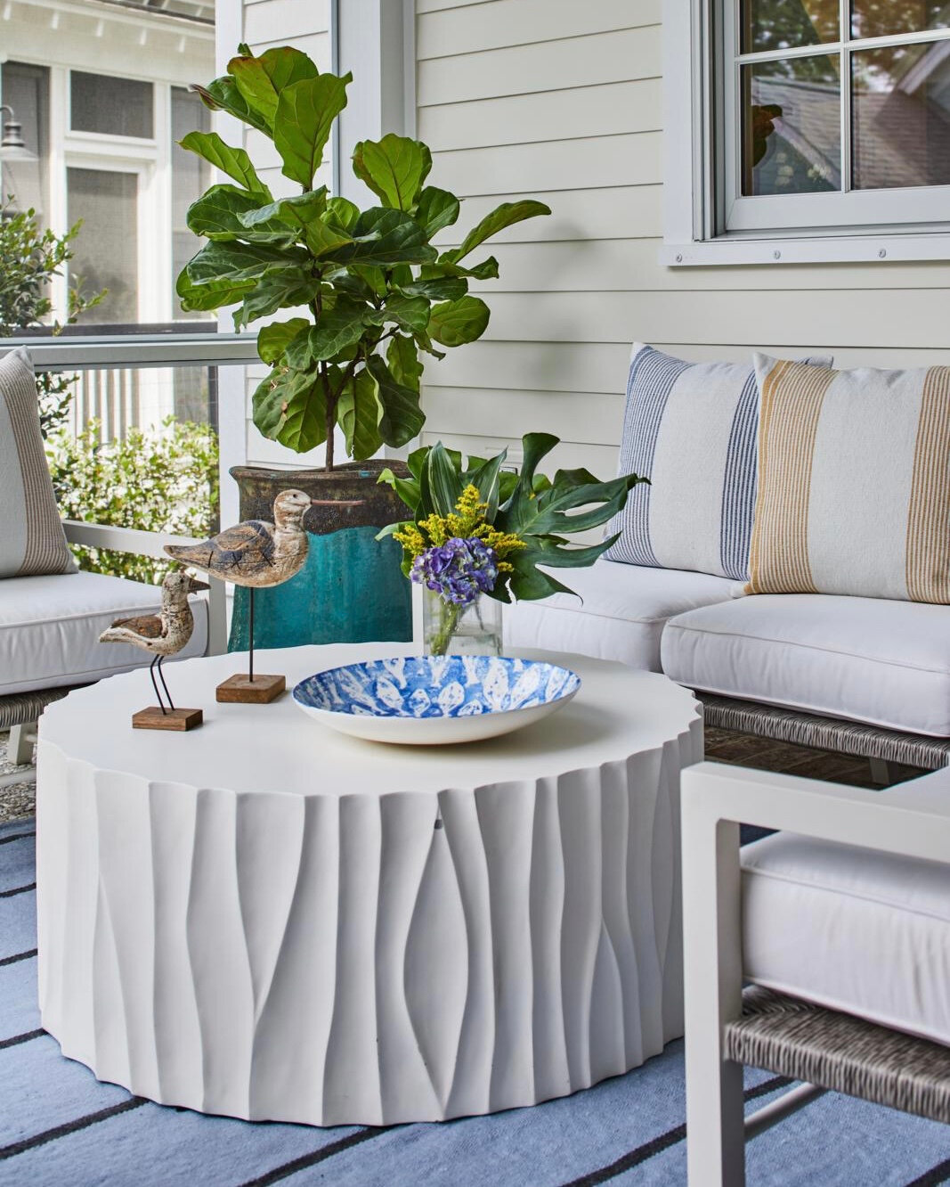 The back porch, an extension of the indoor living space, bringing color, texture and style. ​​​​​​​​
​​​​​​​​
Builder: @allenpattersonbuilders​​​​​​​​
Plan Design: @moserdesigngroup​​​​​​​​
Interior Design: @kathrynlottdesign  Brain Child: @scottride