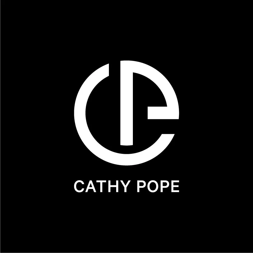 Black background with a white circular logo containing the initials 'CP' and the text 'CATHY POPE' below.