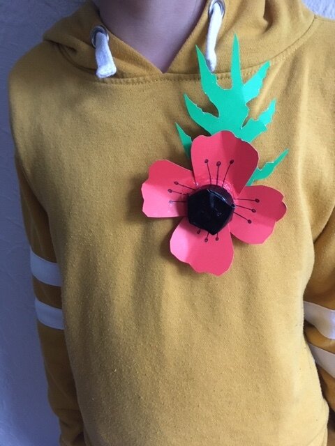 Home made paper poppy badge