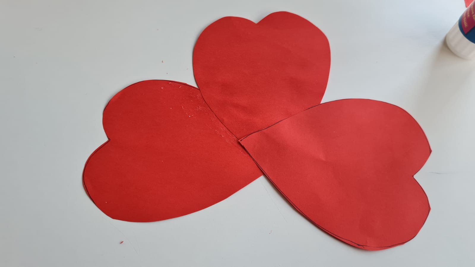 Three cut out heart shapes glued together