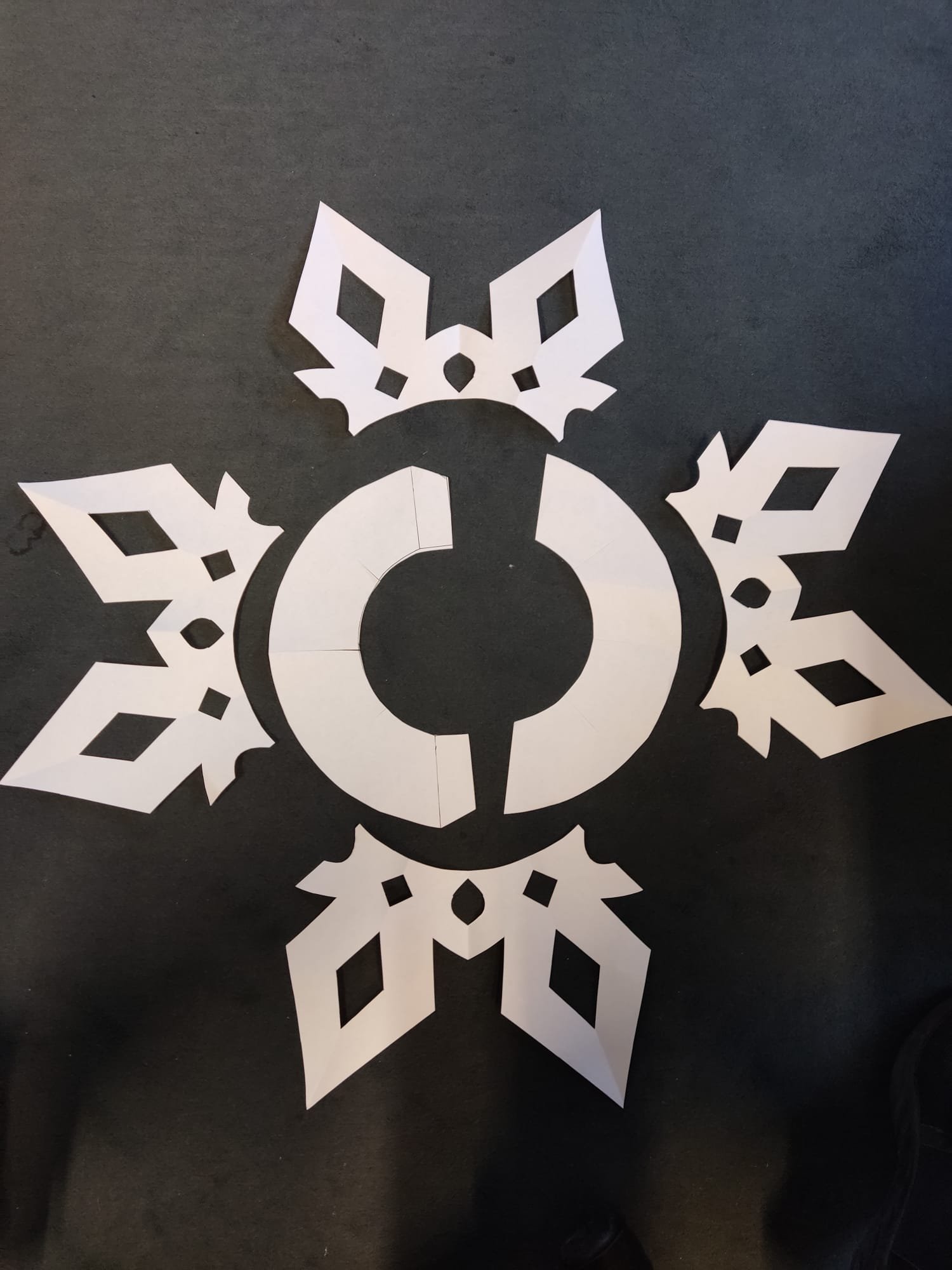 6 pieces of cut out template to form snowflake collar