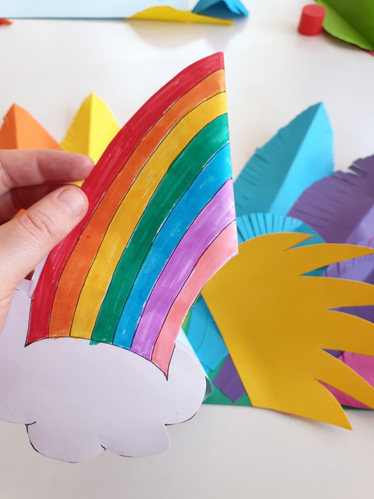 Paper rainbow folded in half