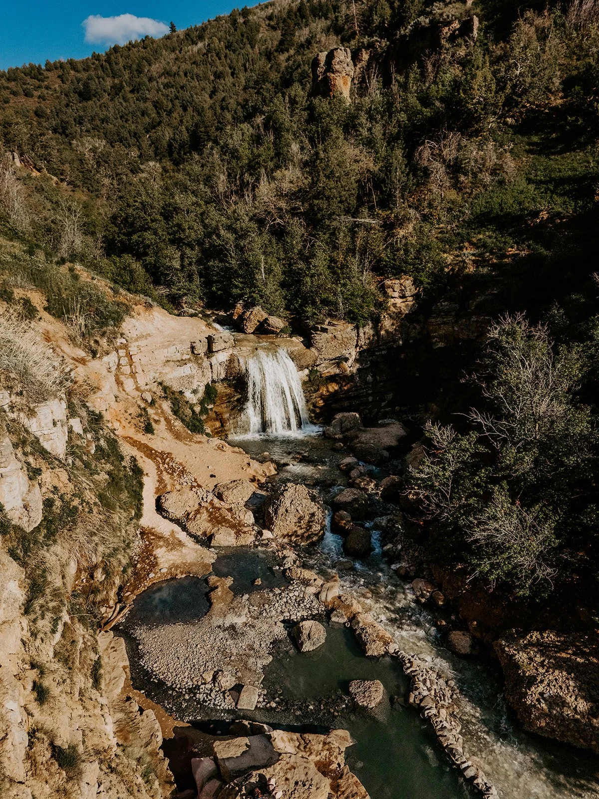 Fifth Water Hot Springs waterfall and turquoise pools in Diamond Fork Canyon near Spanish Fork, Utah