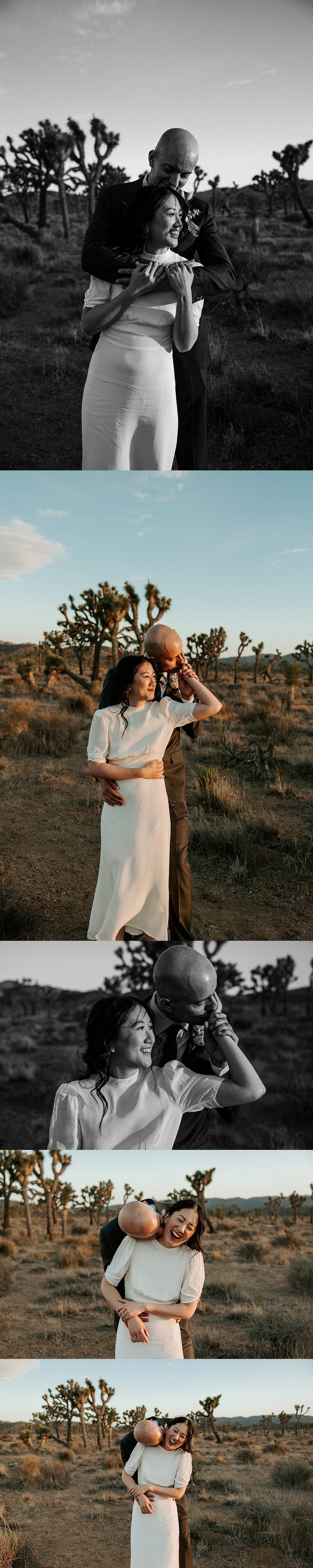 Groom with his arms wrapped around the bride as they sway back and forth and look off into the sun as they're surrounded by Joshua Trees in the open desert.