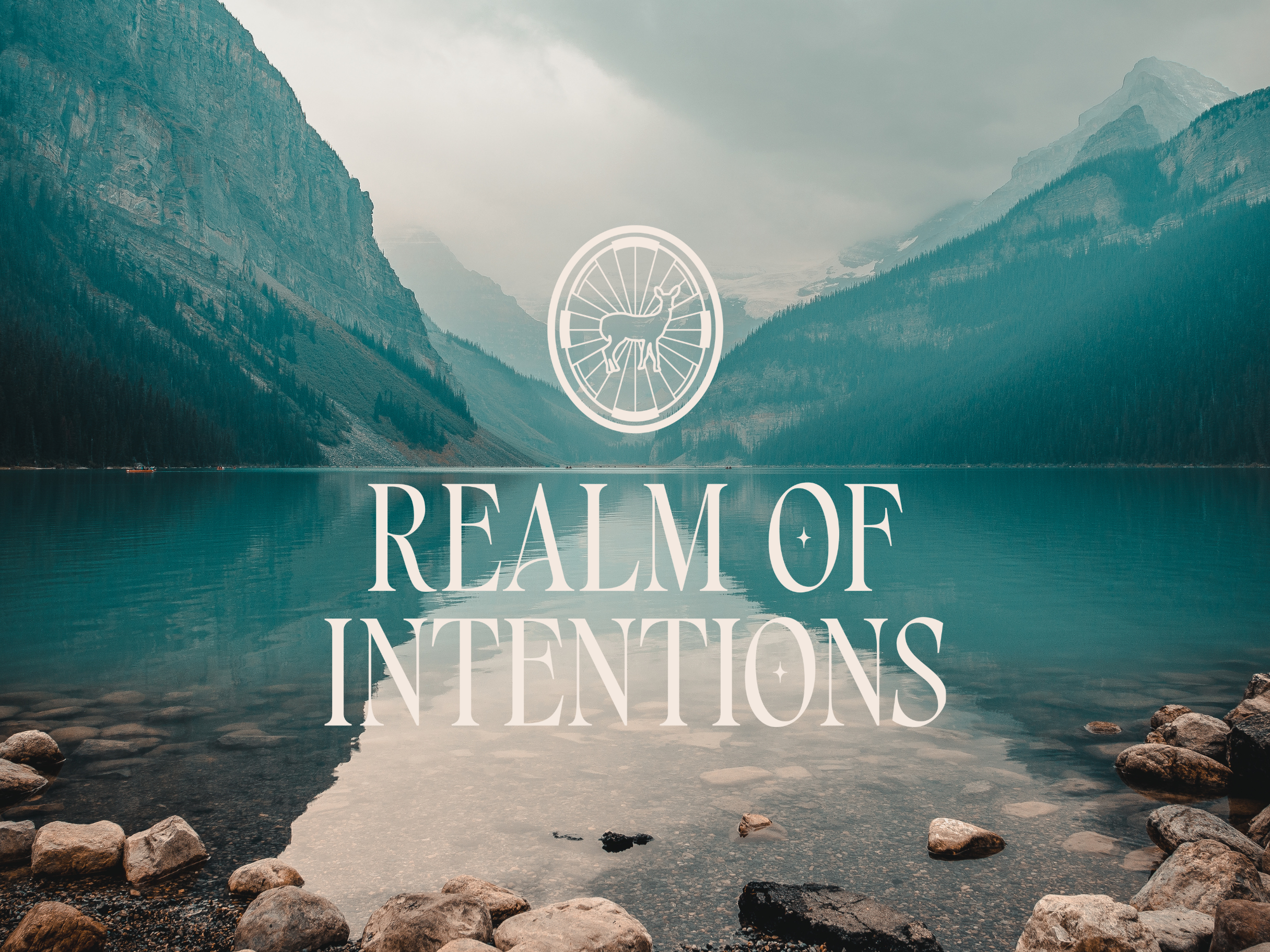 Lake view with Mountains, blue in color with Realm of Intentions logo overlayed on top