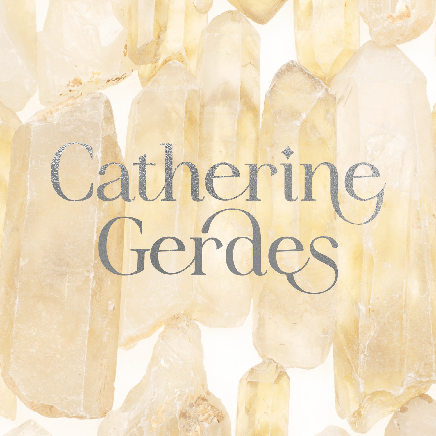 Elegant silver logo design for Catherine Gerdes on a citrine crystal background by Arcoíris Design Studio