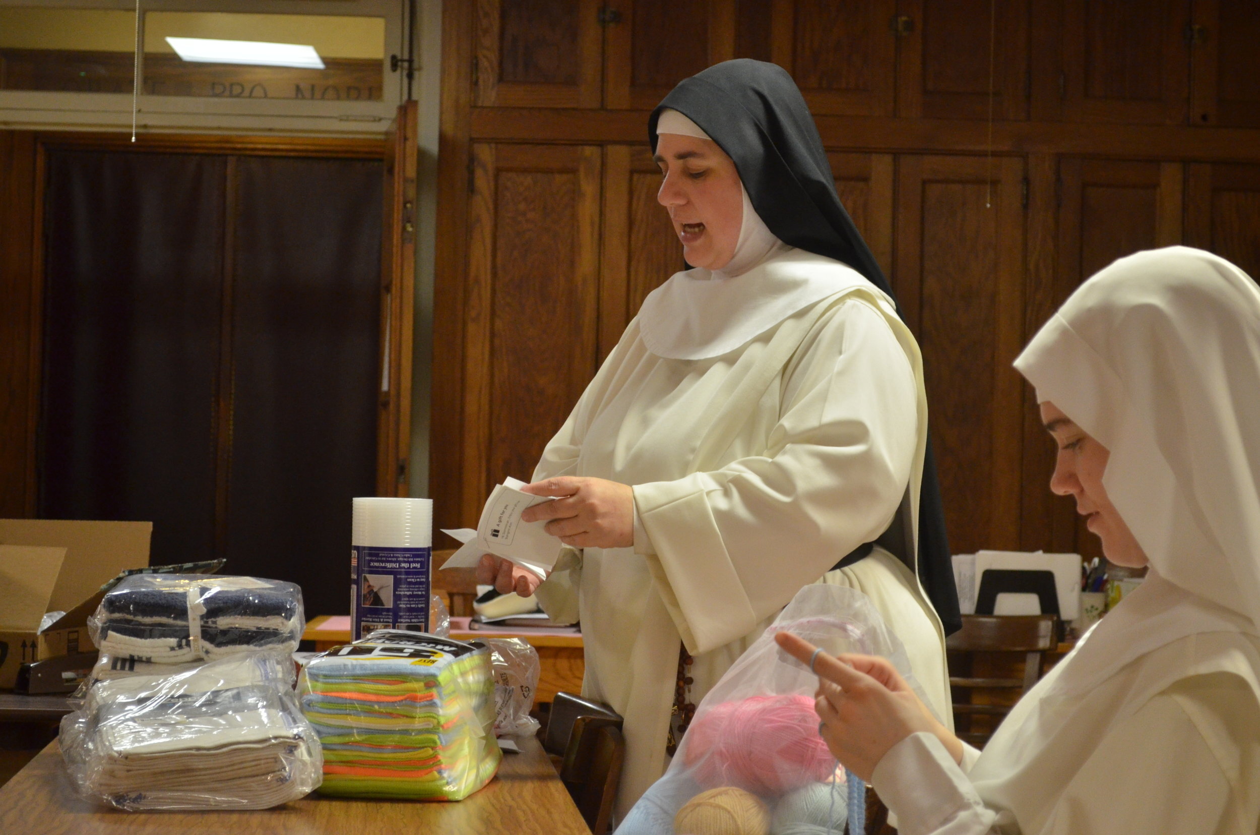 Sr. Mary Catharine reads the names of the purchasers