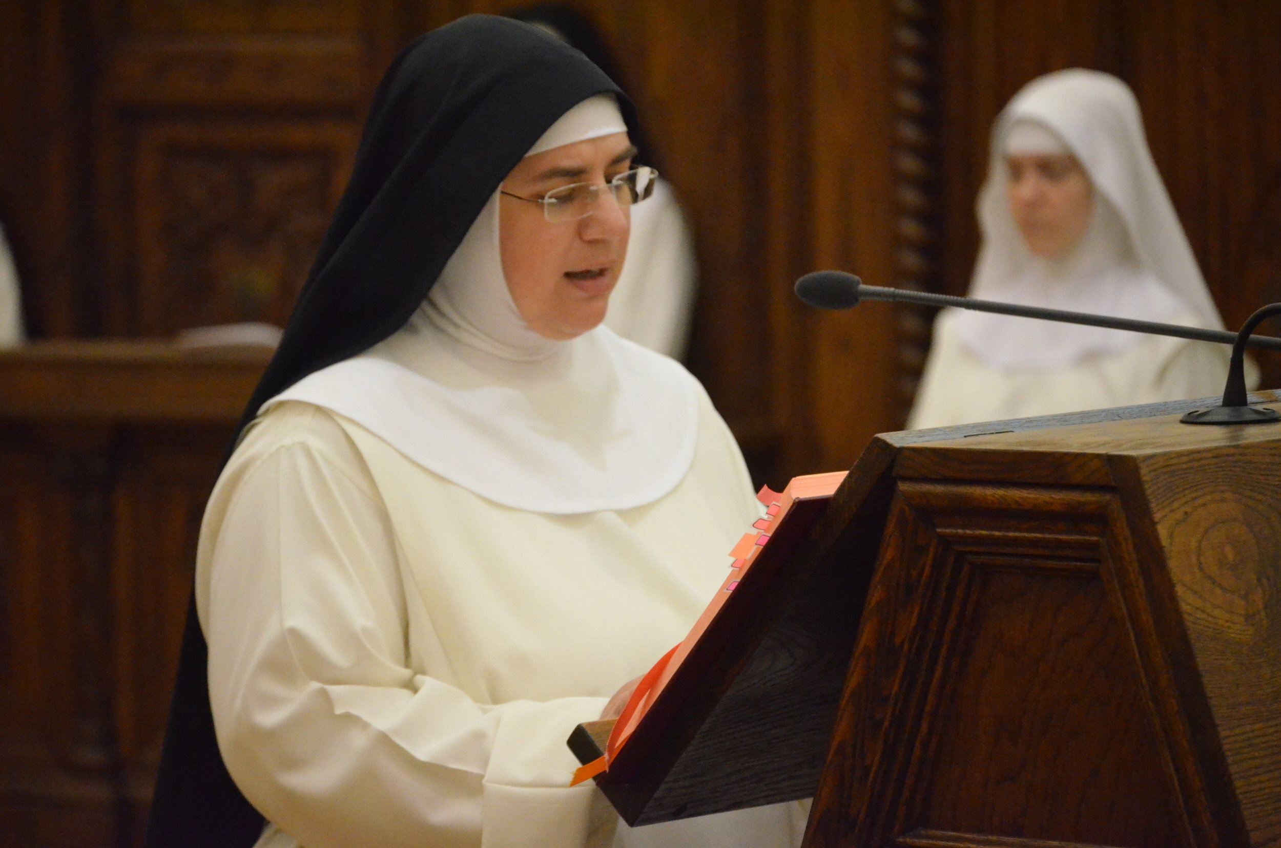 Sr. Mary Catharine chants the First Reading