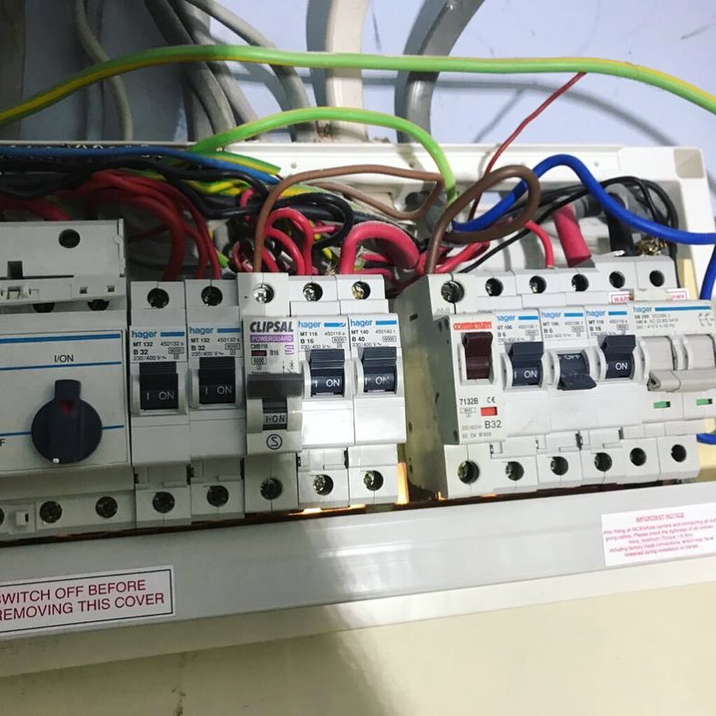 Consumer unit before, during (wires in all directions), Hagar split load 18th edition, and after - connected and tested