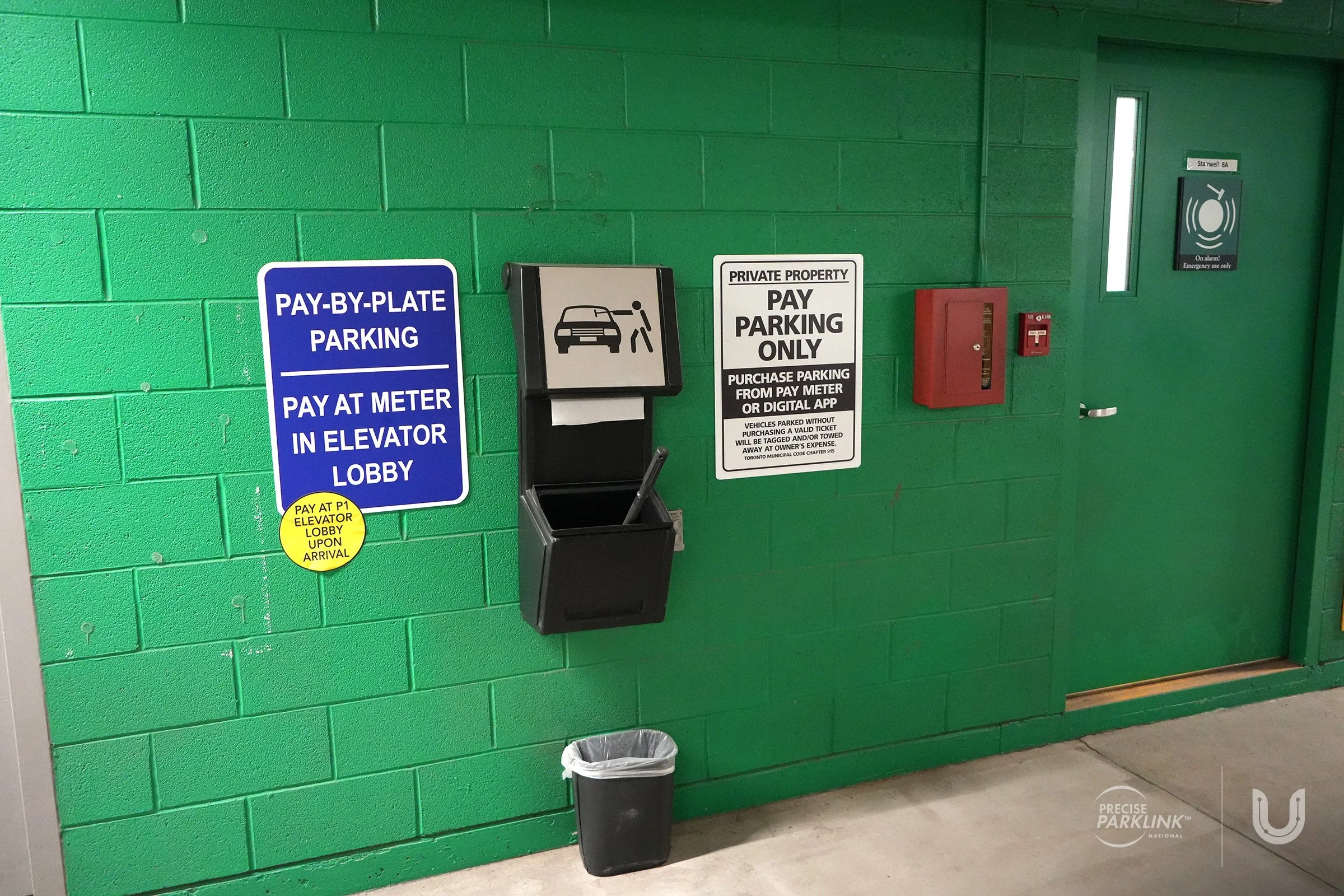 Pay-by-Plate parking signage and window washing station
