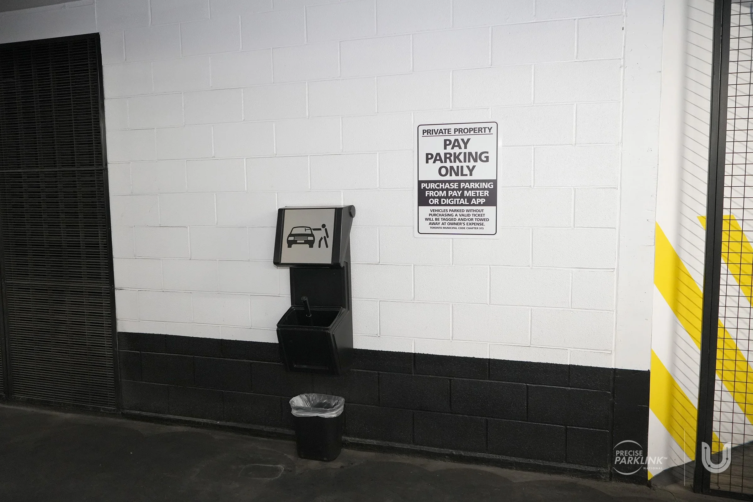 Pay parking signage and window washing station