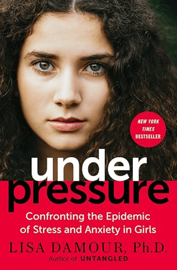 Close-up of a young woman with curly hair and blue eyes on the cover of a book titled "Under Pressure: Confronting the Epidemic of Stress and Anxiety in Girls" by Lisa Damour, Ph.D.