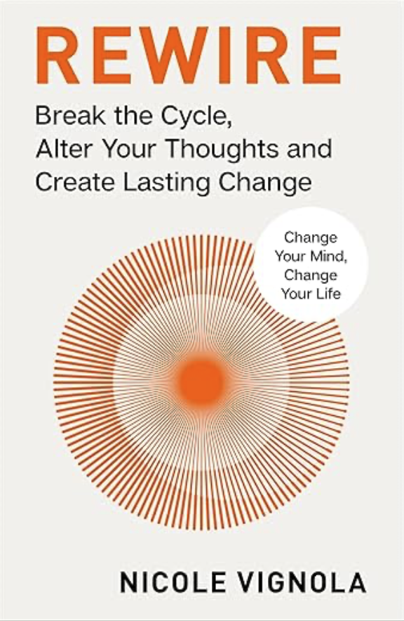Book cover titled "REWIRE" by Nicole Vignola, with a subtitle "Break the Cycle, Alter Your Thoughts and Create Lasting Change." Features a circular, radial graphic design in orange shades with a small white circle containing the text "Change Your Mind, Change Your Life."