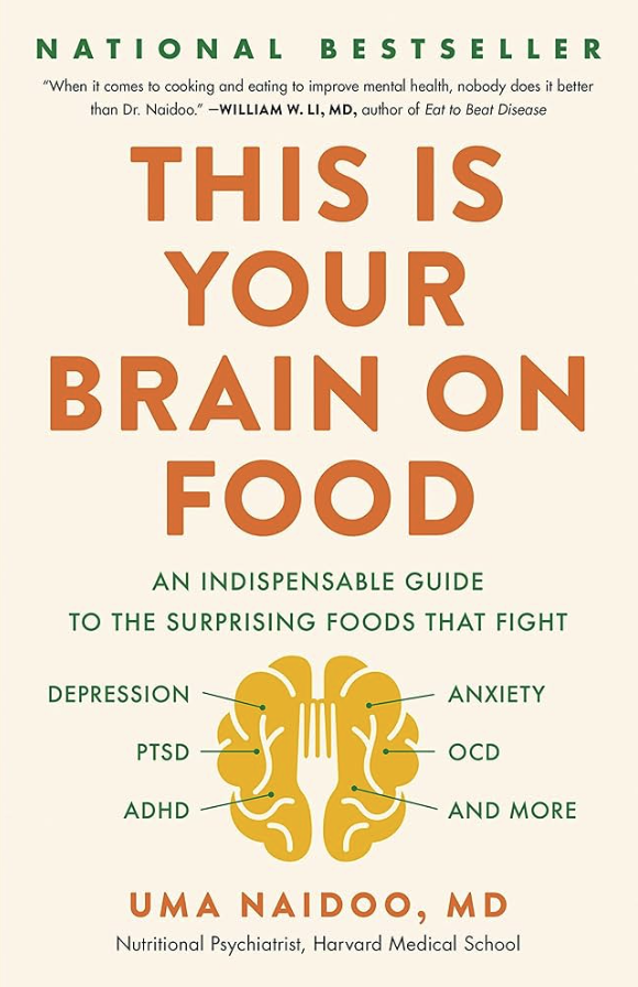 Cover of a book titled 'This Is Your Brain on Food' by Uma Naidoo, MD, with a graphic of a brain shaped like a fork, listing mental health conditions like depression, anxiety, PTSD, OCD, and ADHD.