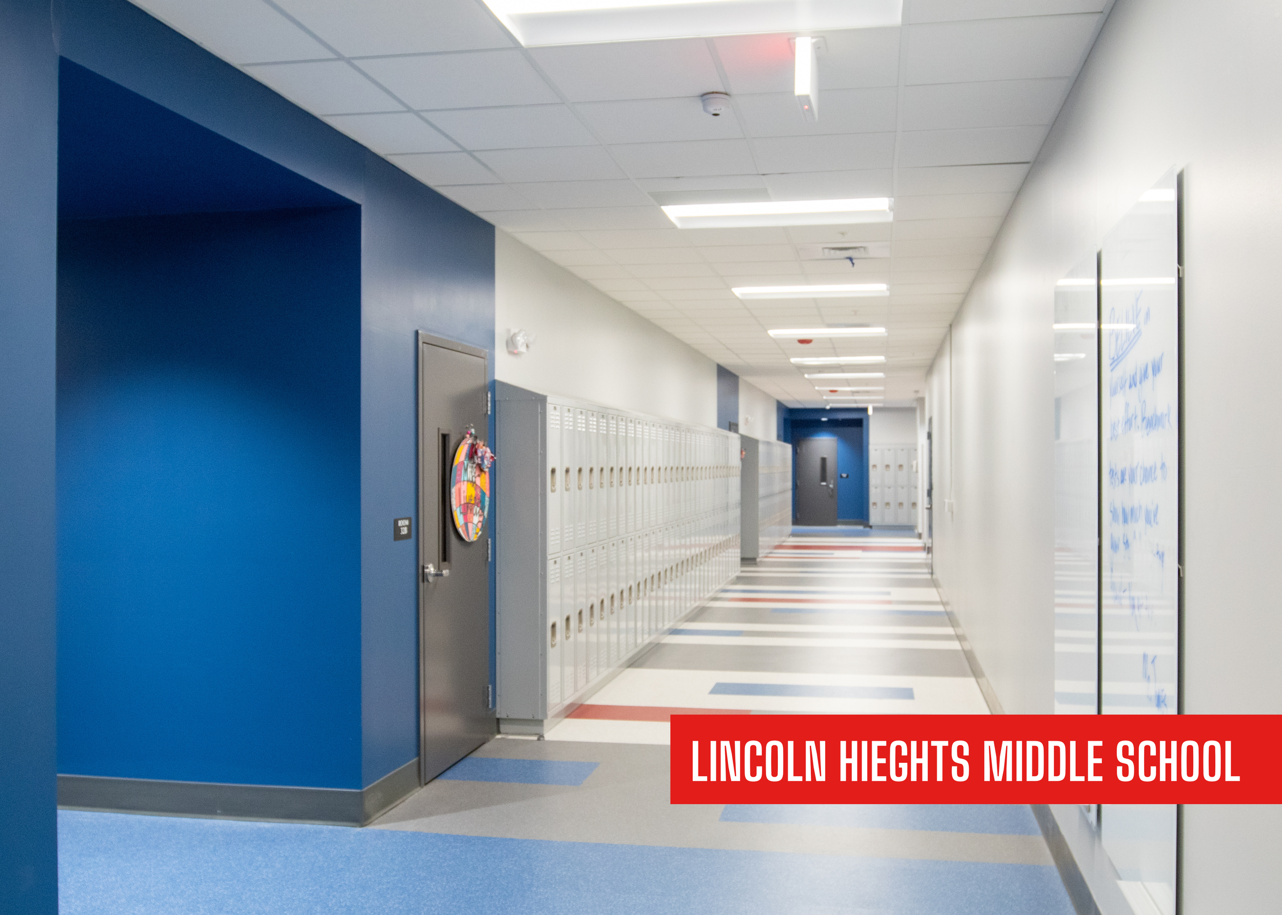 Lincoln Heights Middle School in Hamblin County, Tennessee remodeled and built with P&C Construction. A bright education hallway with lockers and blue accents.