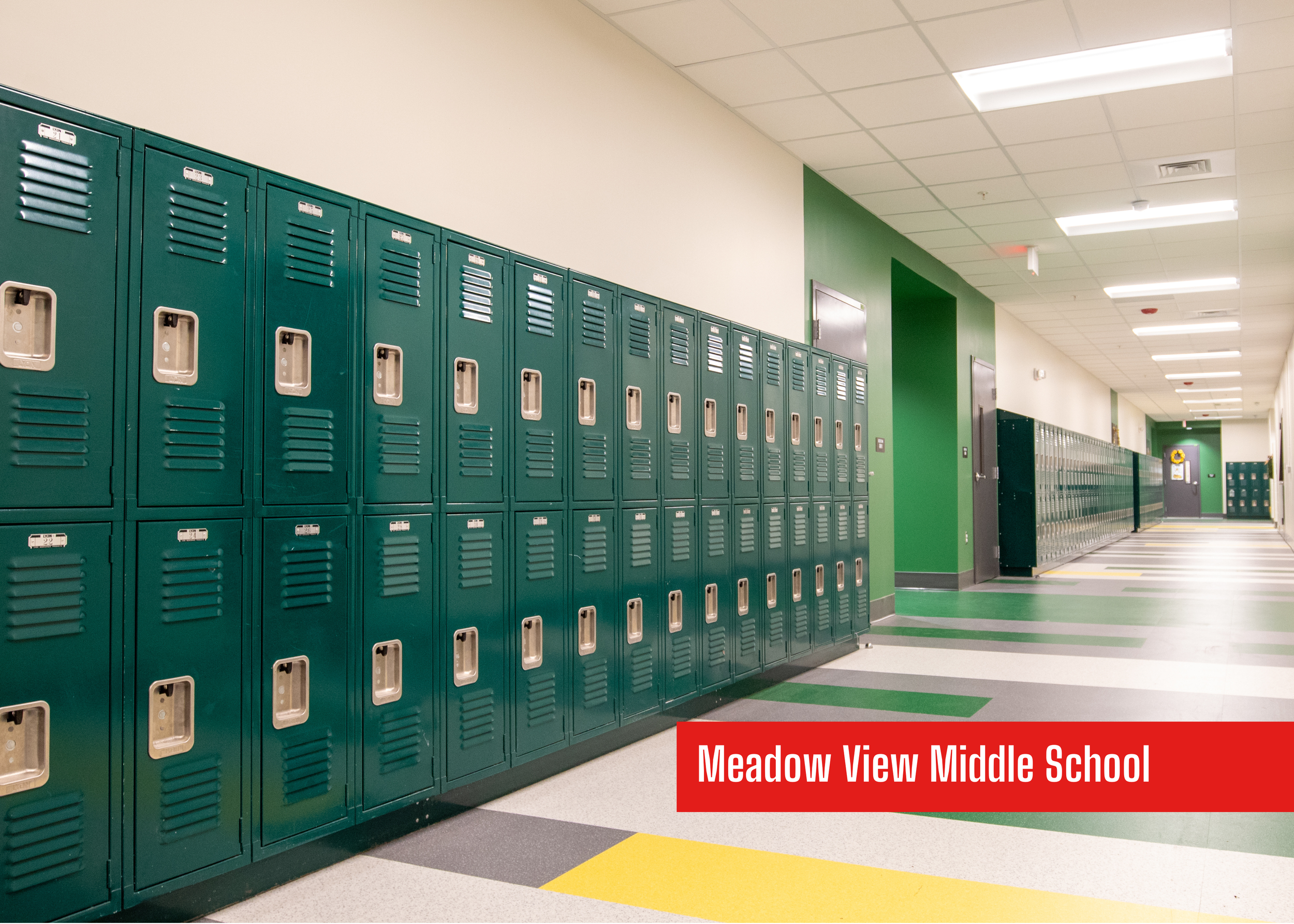 Meadow View Middle School remodeled by P&C Construction showing a bright hallway with green and yellow accents lined with dark green lockers for safe educational spaces.