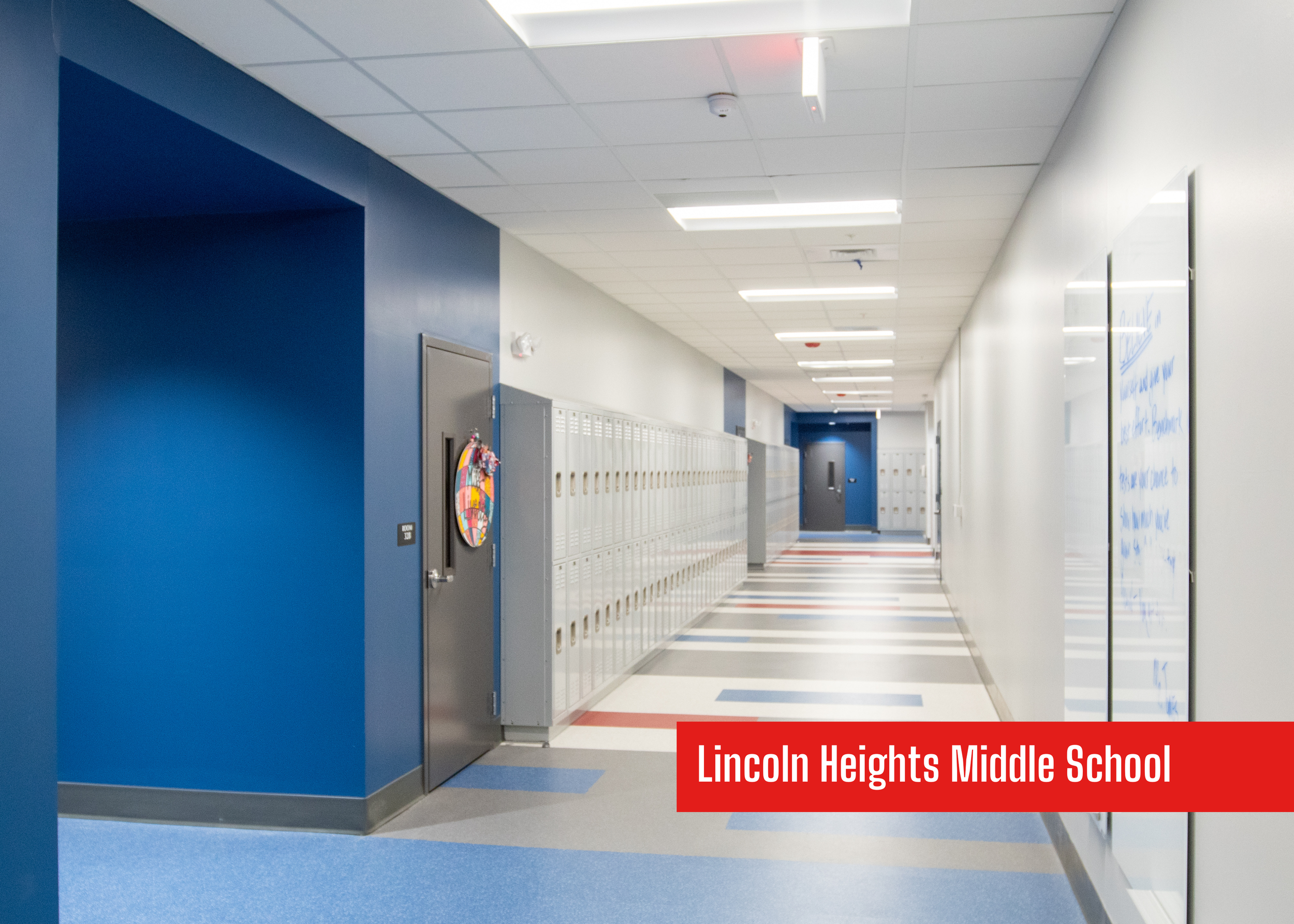 Lincoln Heights Middle School in Hamblin County, Tennessee remodeled and built with P&C Construction. A bright education hallway with lockers and blue accents.