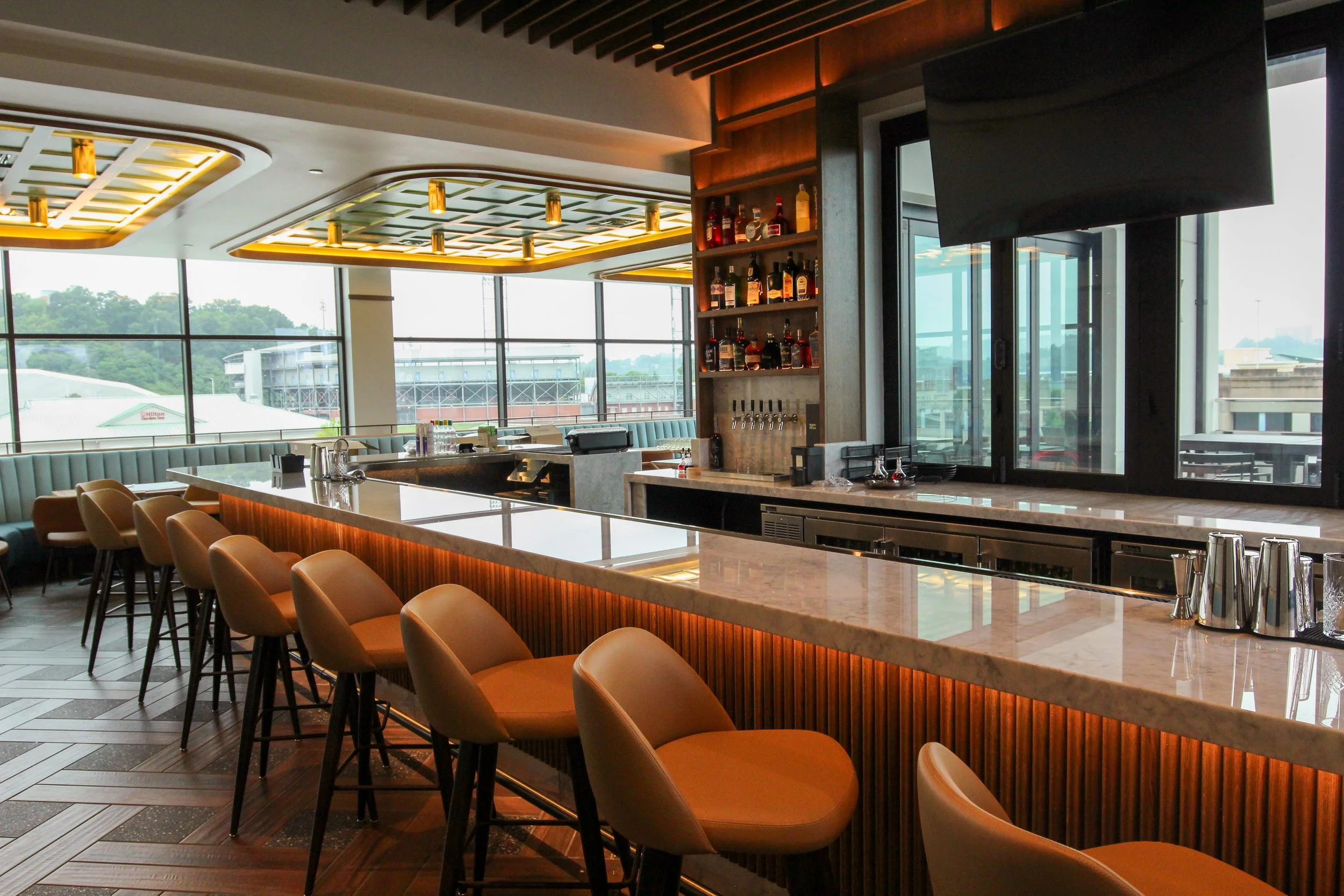 Embassy Suites by Hilton is a 7th floor remodel and renovation by P&C Construction in downtown Chattanooga, TN of their top floor restaurant, kitchen, bar, and outdoor patio, as well as first floor training facilities and more.