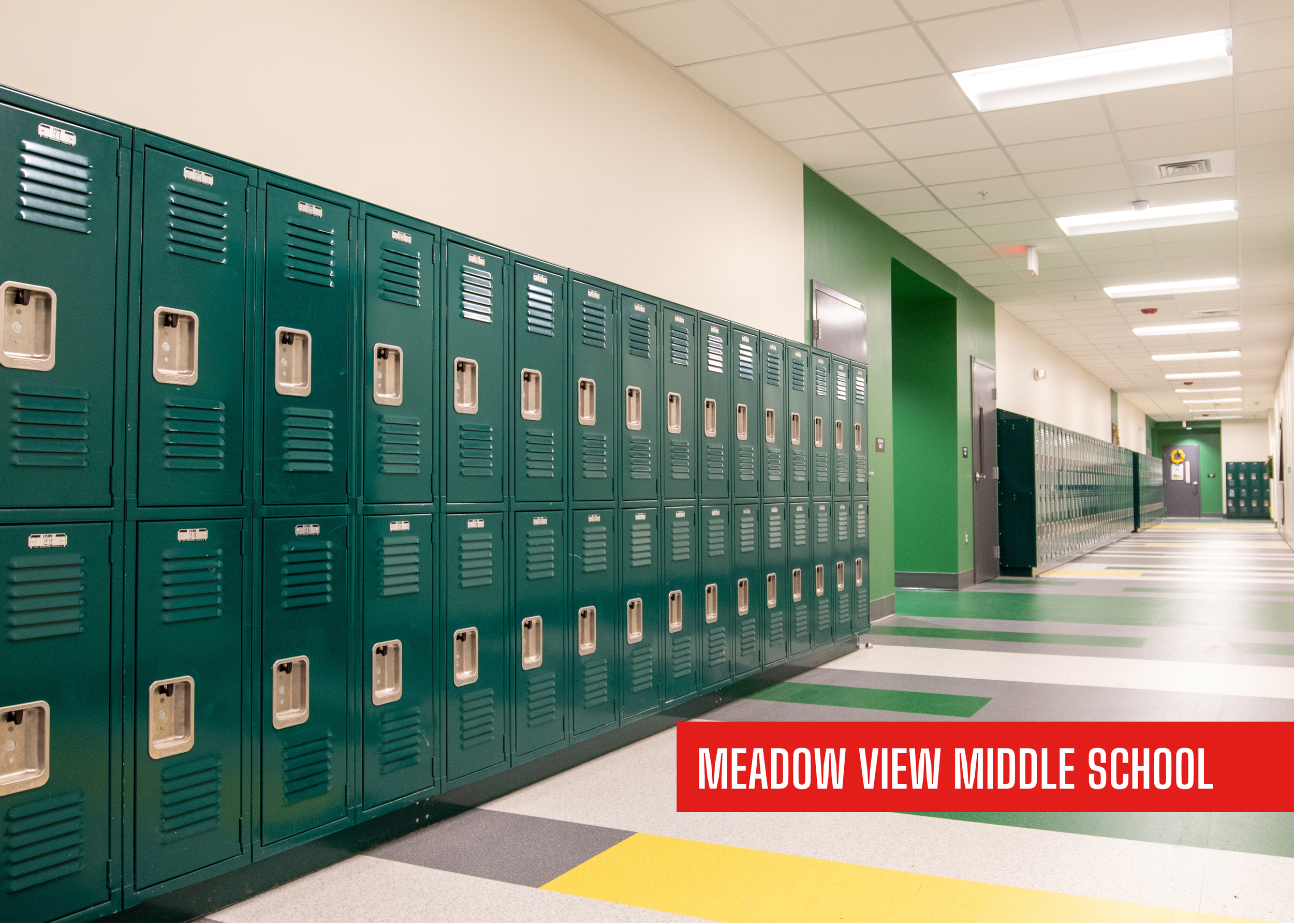 Meadow View Middle School remodeled by P&C Construction with bright hallways and green and yellow school color accents lined with dark green lockers for safe educational spaces.