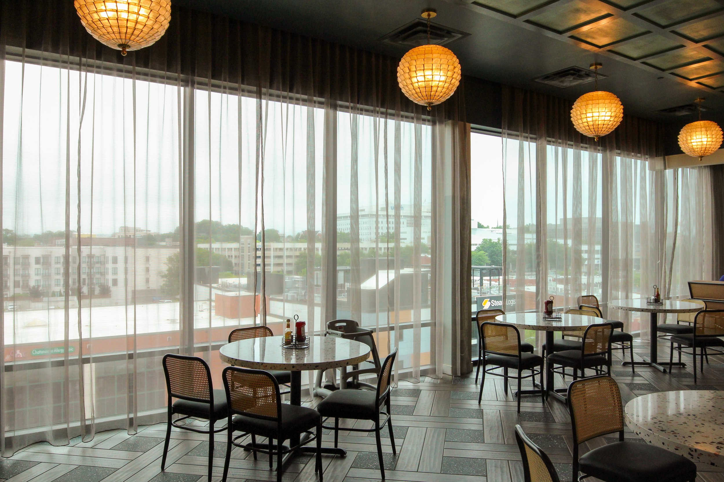 Embassy Suites by Hilton is a 7th floor remodel and renovation by P&C Construction in downtown Chattanooga, TN of their top floor restaurant, kitchen, bar, and outdoor patio, as well as first floor training facilities and more.