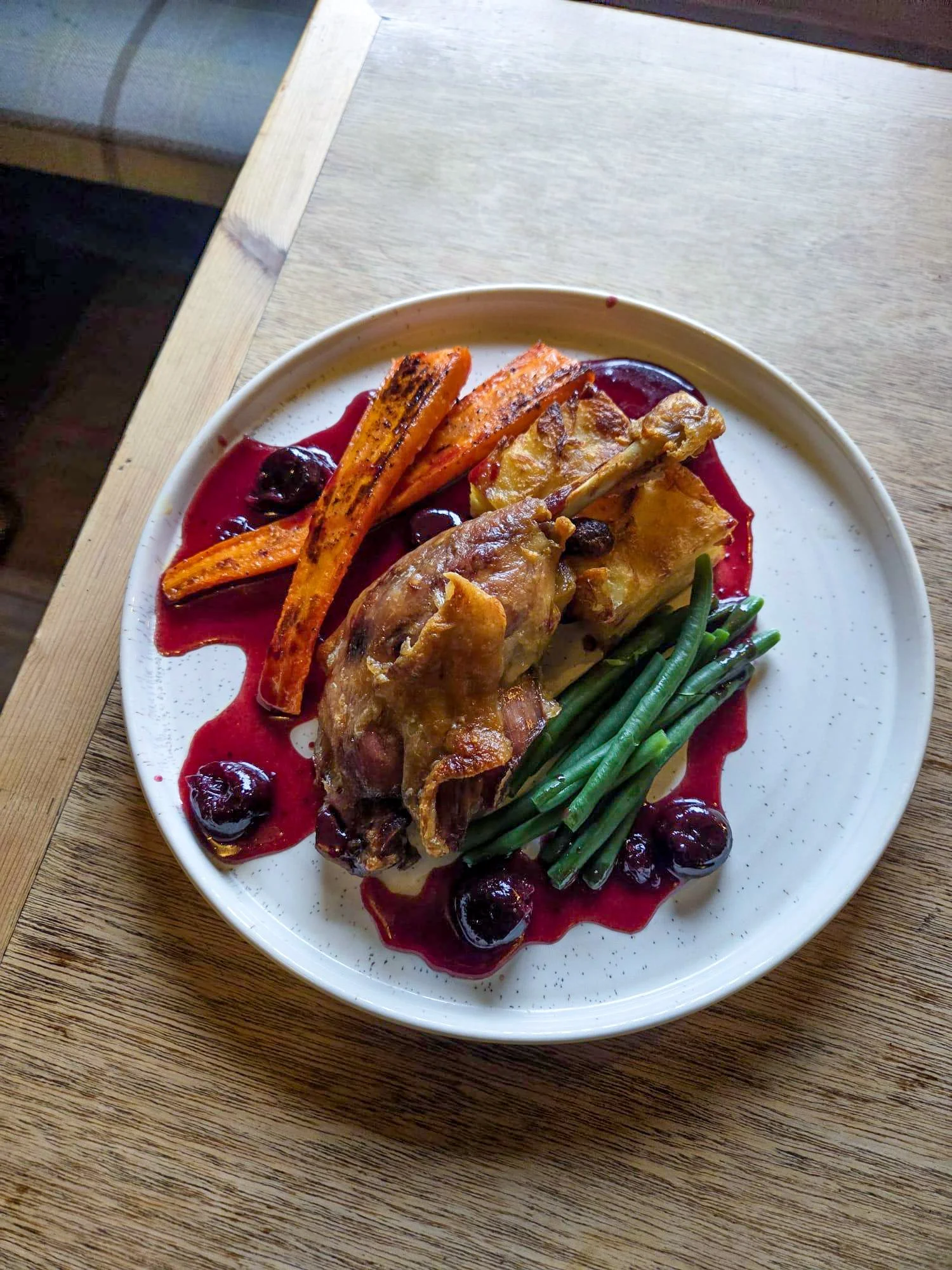 Confit Duck Leg, Dauphinoise Potatoes, Carrots, French Beans, Cherry & Port Sauce