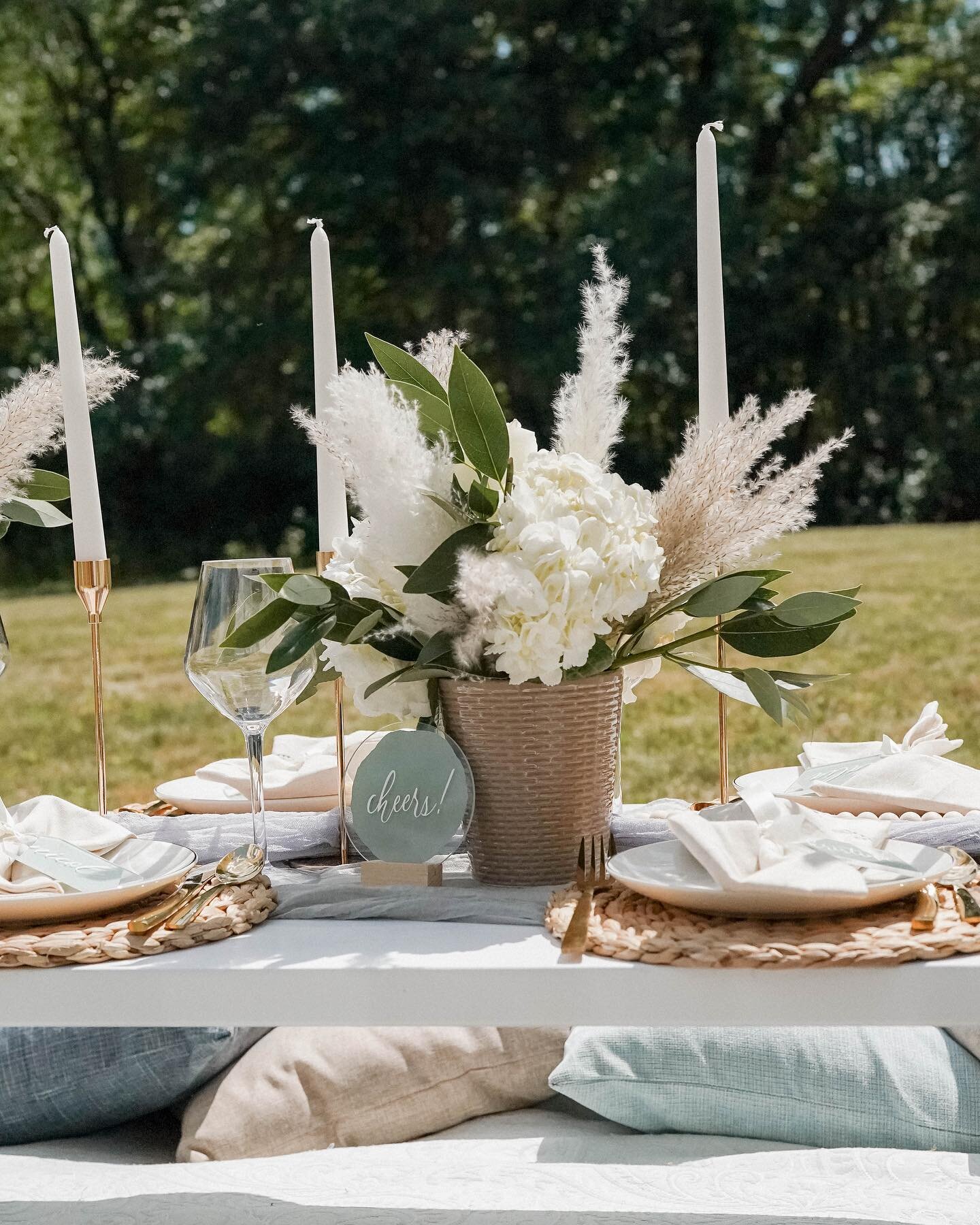 Cheers 🥂
&bull;
The one of a kind picnic experience with your favorite people. 
&bull;
Event planner &amp; designer: @enchantedevents.ri 
Decor/rentals: @alacart_ri 
Florist: @abushelandapeckfloralshop 
Signs: @hopeinhandfuls 
Photographer: @kelsima