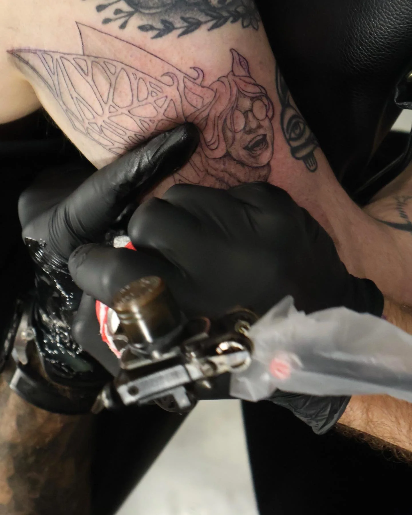 I tattooed this Ozzy bat at a recent convention up in Maine. Last one of the day and they literally kicked me out before I could grab a good photo but my lovely lady @emmagazley snapped a cool action shot for me at least. I&rsquo;ve got more ozzy tri