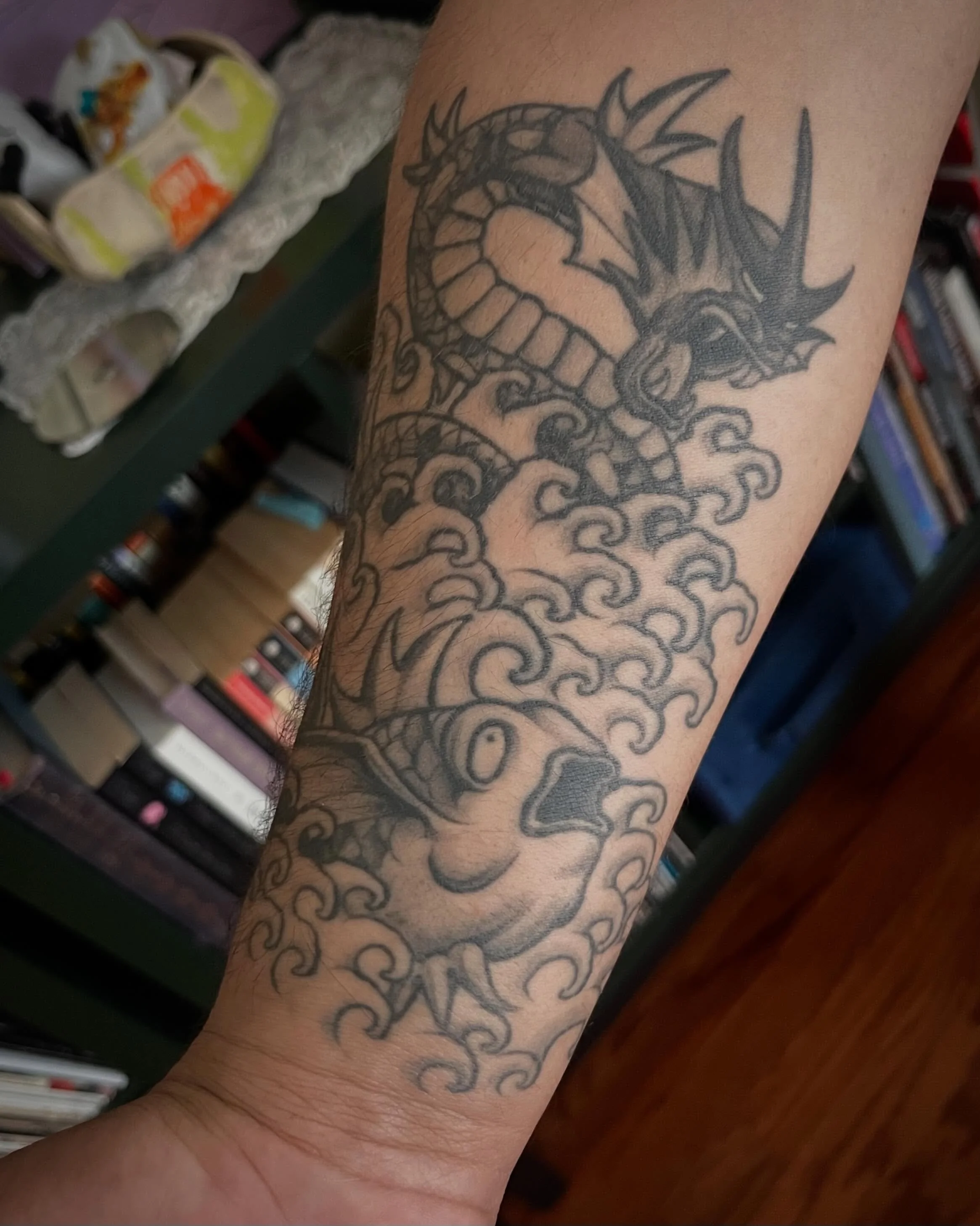 Couple a healed nerdy pieces for my friend @iamchrisfrias the gyarados and magikarp on one arm annnnd the buster sword from Final Fantasy. Pokemon piece is round about 3 years old and I about a year old for the buster sword