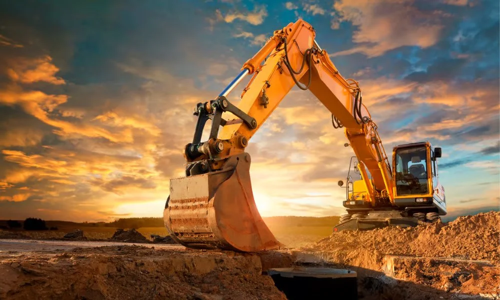 A construction excavator is the type of heavy industrial equipment that Breakthrough Industrial Solutions services.