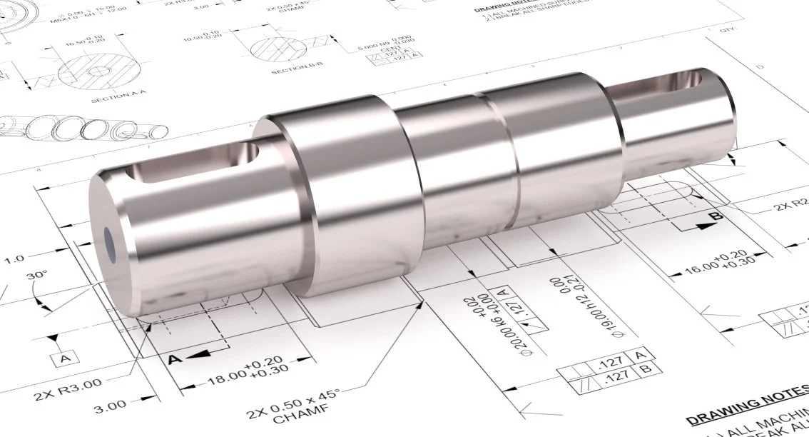 A 3D rendered metallic shaft placed on detailed engineering blueprints with measurements and annotations.