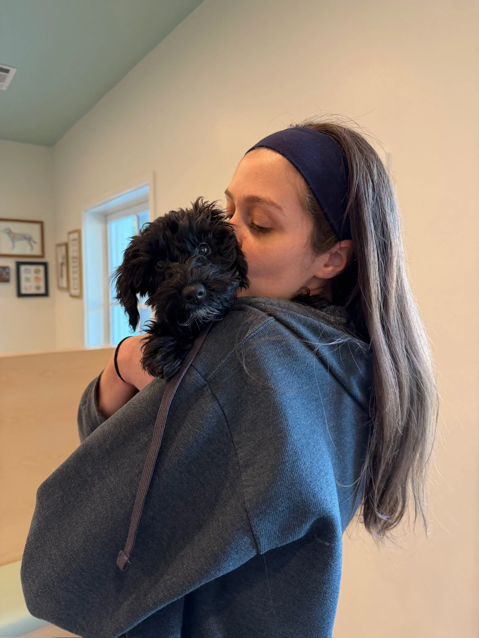 Neighborhood Vet Team loves puppies.JPG