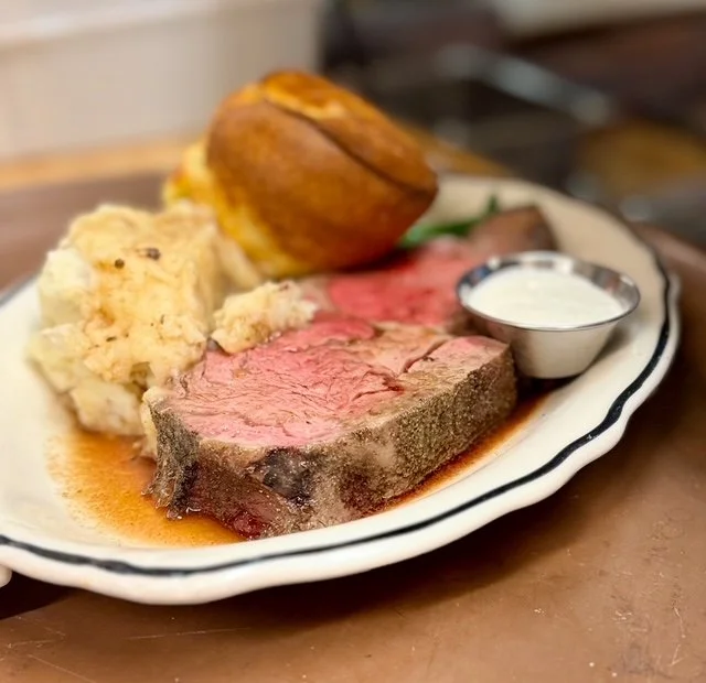 Medium rare delicious prime rib pop over mashed potato house radish sour cream 