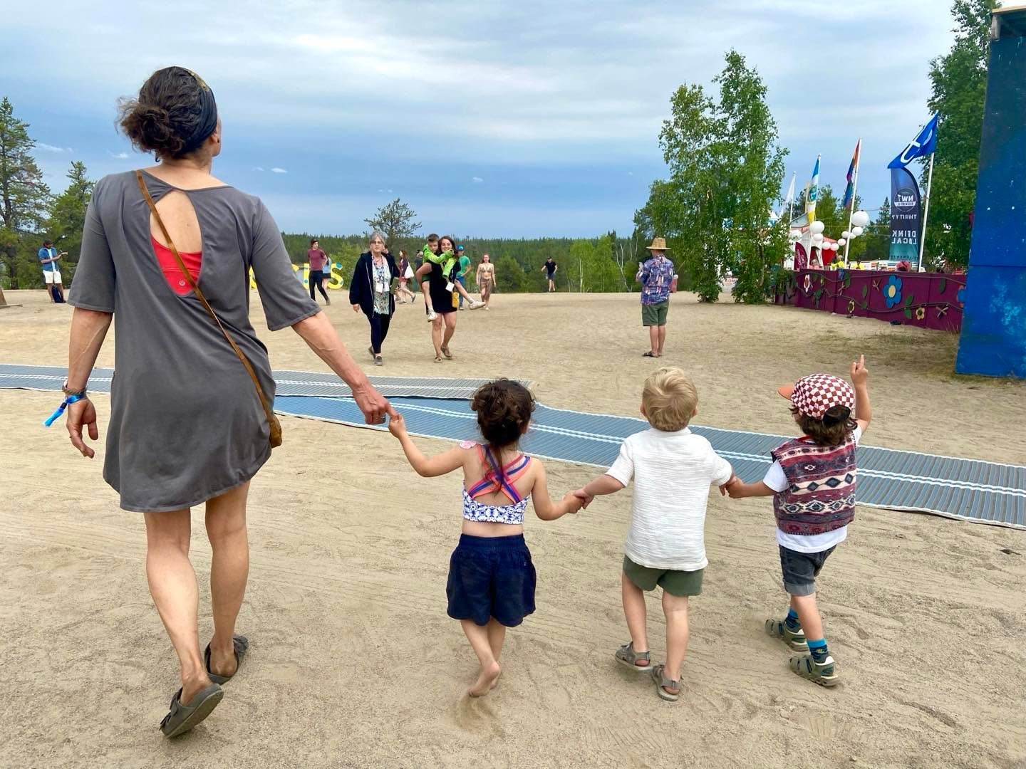 What a great gift to enjoy #FolkontheRocks2024 with my grandkids, much the same way I did with their fathers. #Yellowknife #festivals #livemusic #toocute @folkontherocks