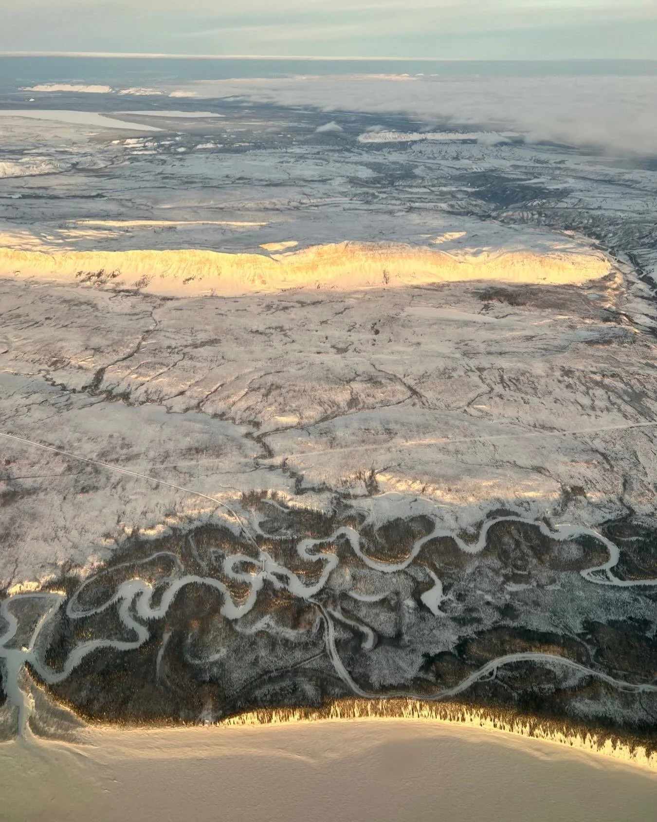 Sun setting somewhere near Tłegǫ́hłı̨ (Norman Wells). Mind boggling how deep time paints a landscape. Thank you to the workshop participants in Inuvik and Hay River for all your teachings. It&rsquo;s good to be home. Looking forward to hugging my lit