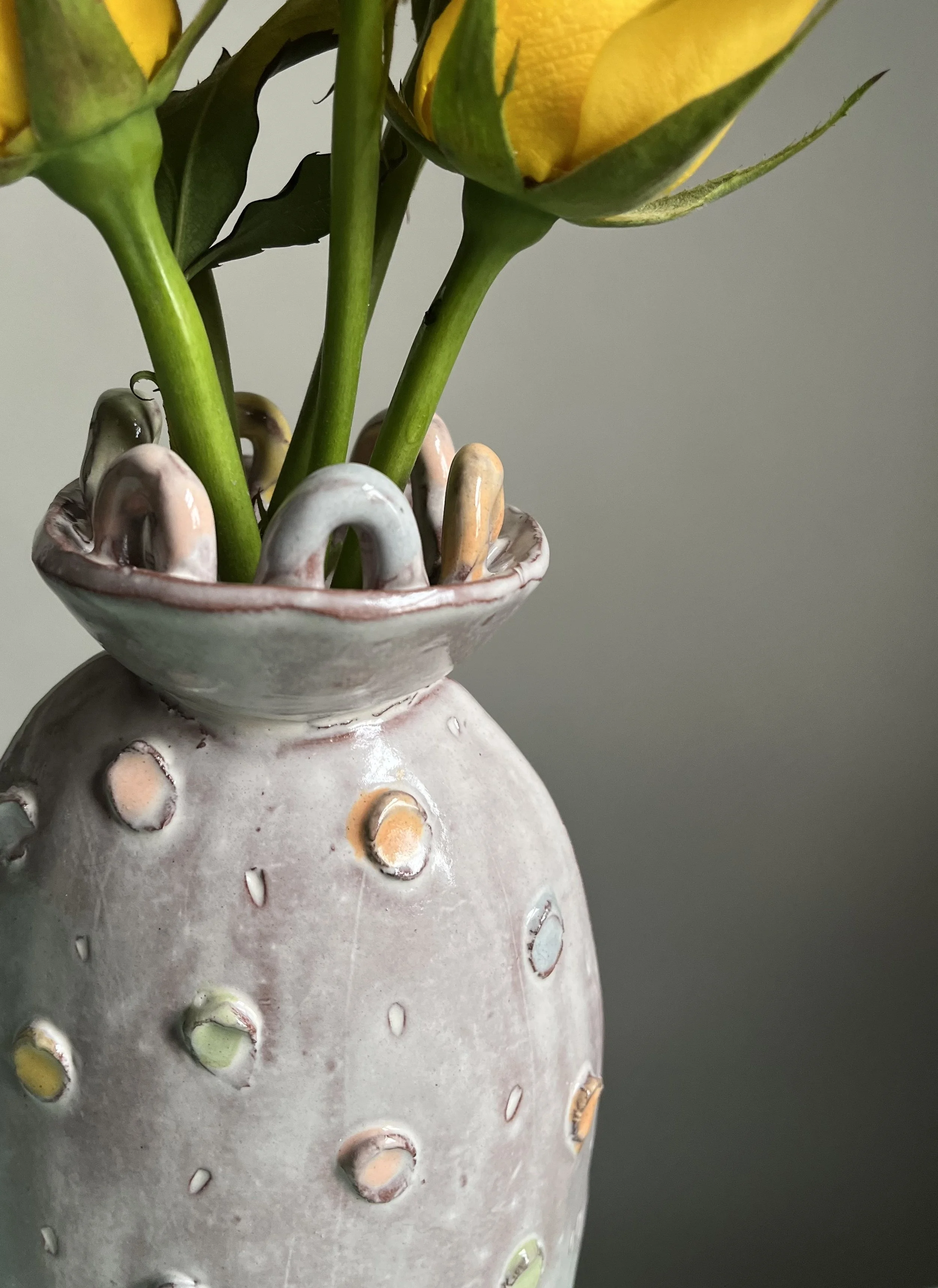 hand-built vase with coil loops