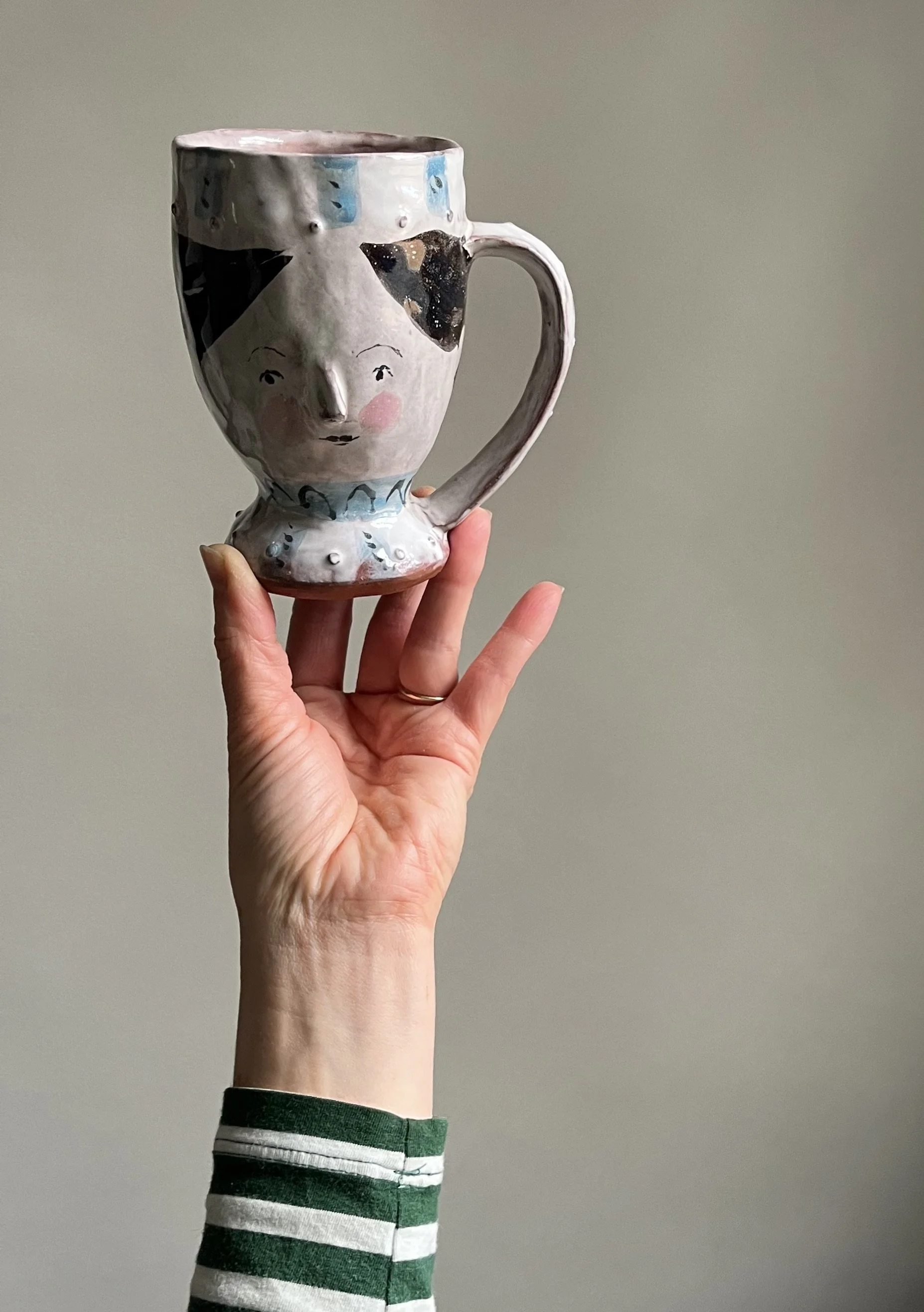 Illustrated earthenware coffee mug