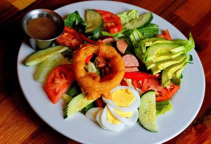 &bull; Nana&rsquo;s Salad &bull; Five reasons to love this salad. Avocado. Sausage. Hard-boiled egg. Crisp, fresh greens. Oh, and an ONION RING! 
#ThePlaceAthens 
#AthensGa