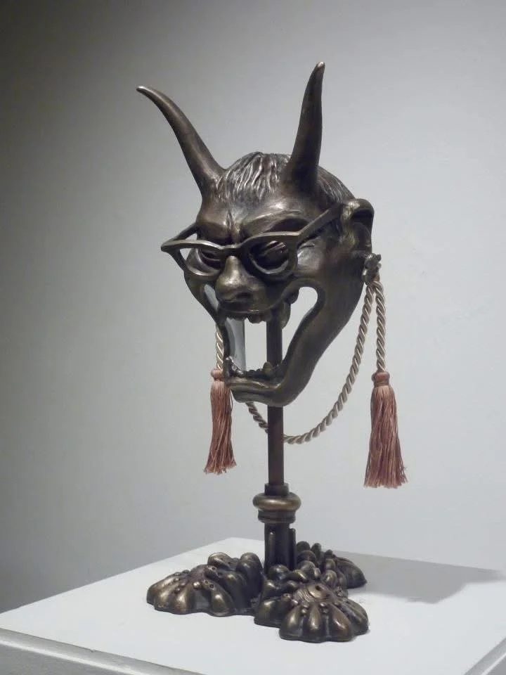 "Noble Woman Hannya (with stand)"
Cast Bronze, Copper Pipe, Satin Cord, Enamel
10" x 10" x 20"