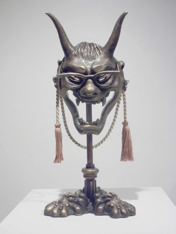 "Noble Woman Hannya (with stand)"
Cast Bronze, Copper Pipe, Satin Cord, Enamel
10" x 10" x 20"