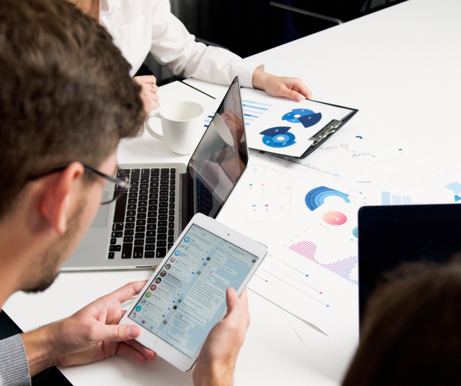 man interacting on social media and looking at engagement