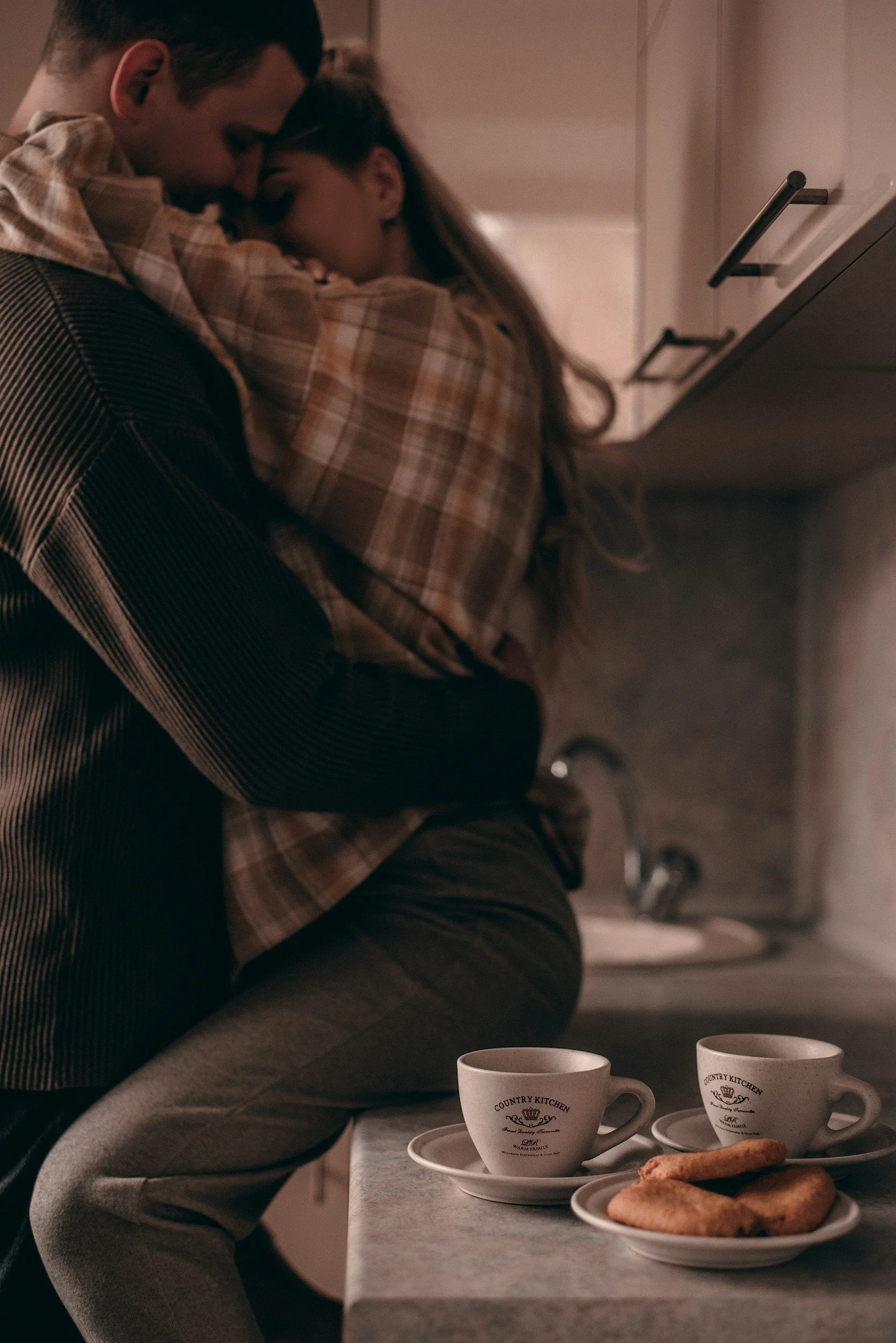 Couple hugging and comforting each other, showing reassurance and emotional support during relationship repair and couples therapy in Utah
