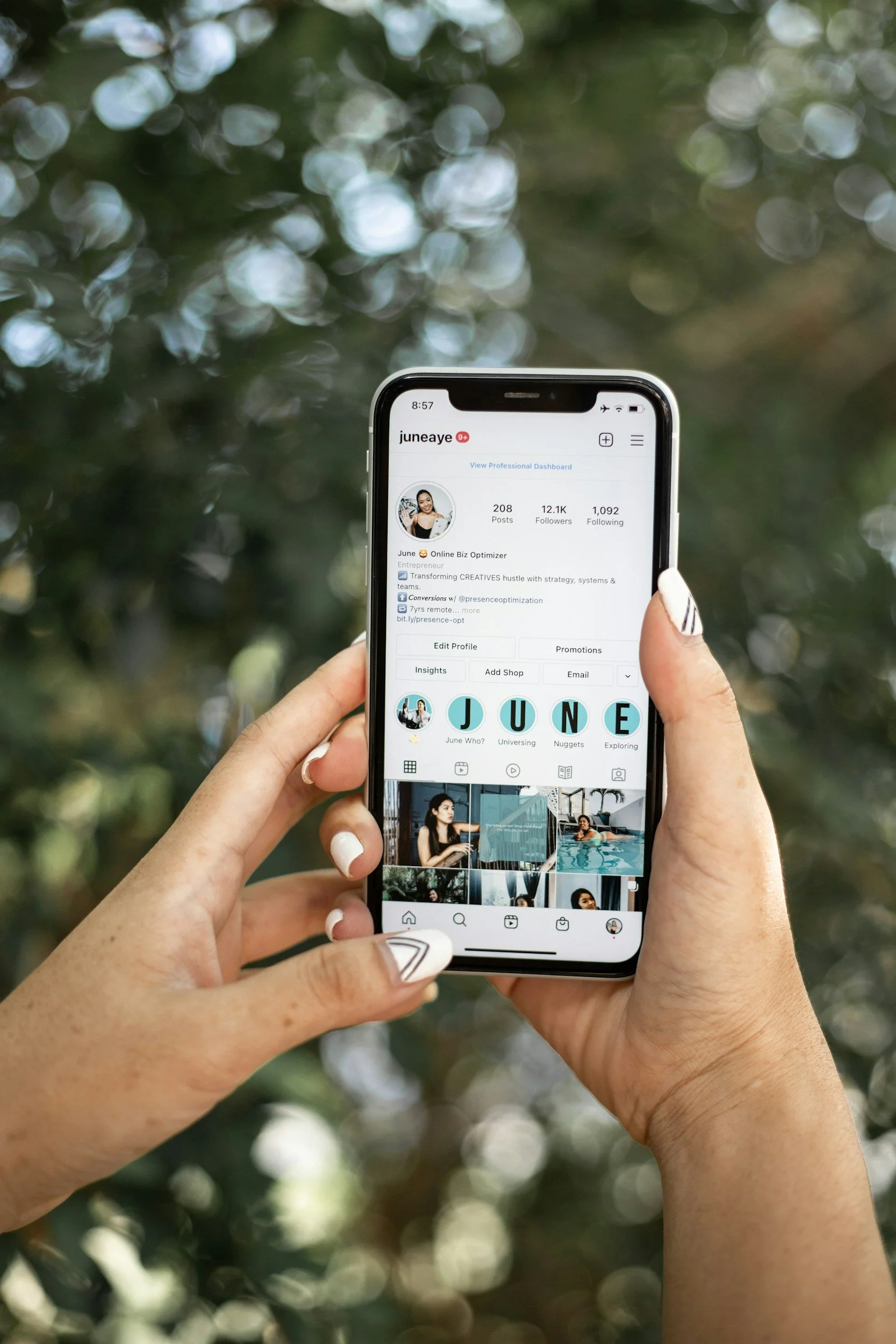 Individual viewing social media content on a smartphone, representing social media's influence on body image, self-esteem, comparison, and diet culture.